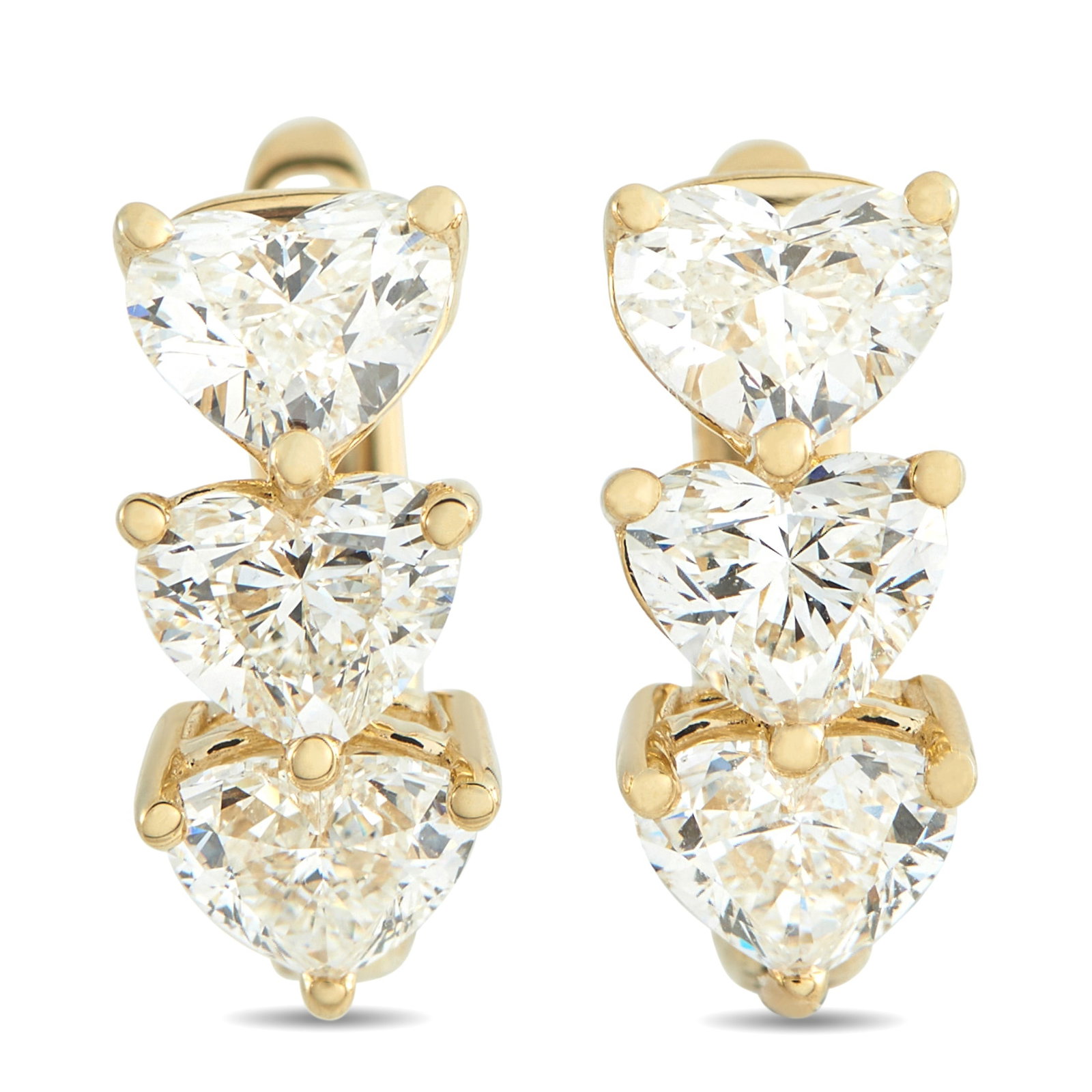 18K Yellow Gold 3.0ct Diamond Earrings: Heart-shaped Diamonds with a total weight of 3.0 carats make these luxury earrings simply unforgettable. Perfect for any true romantic, each earring features an 18K Yellow Gold setting and measures