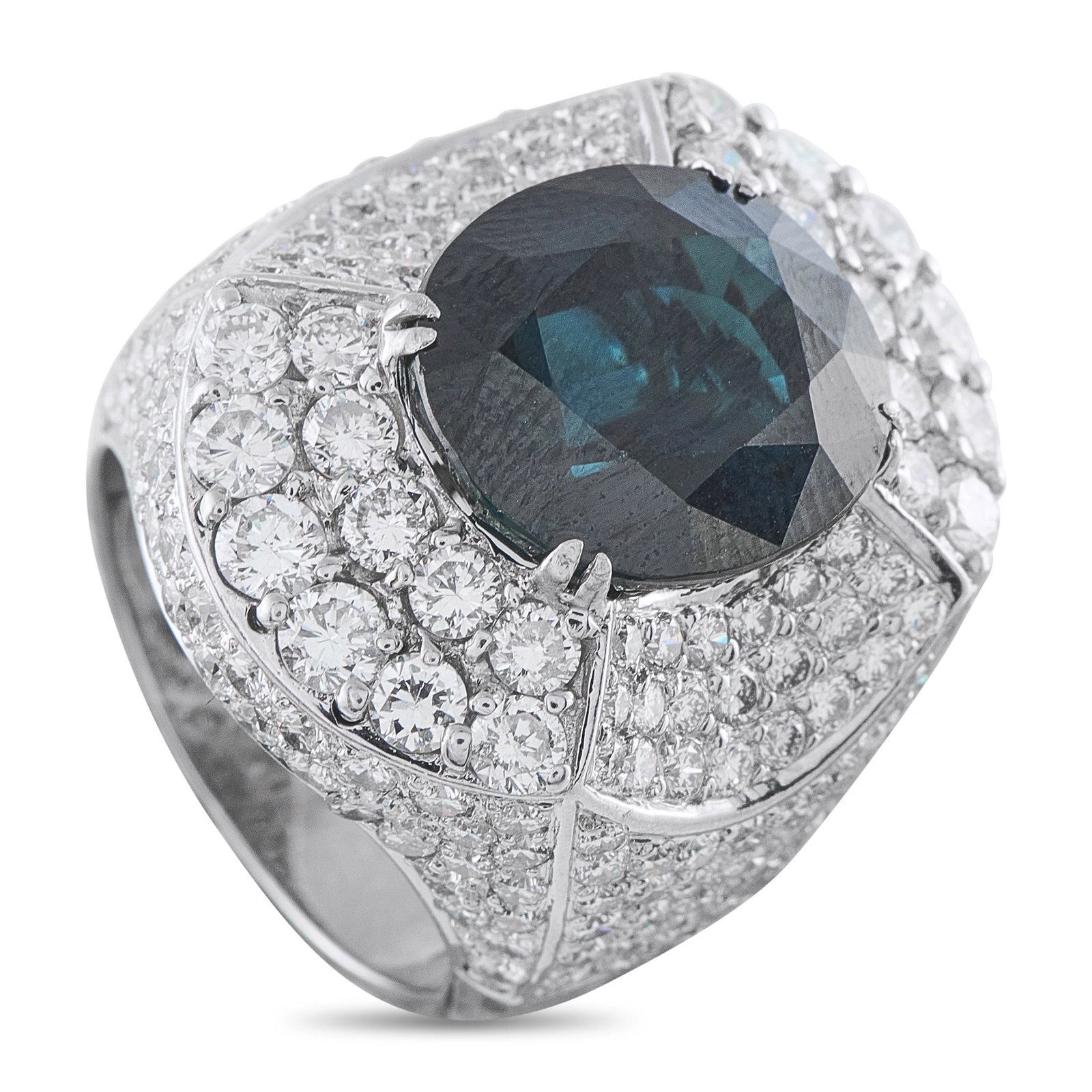 18K White Gold 4.0ct Diamond and Sapphire Cocktail Ring: A magnificent cocktail ring in 18K white gold, centering a deep blue oval sapphire of approximately 12.50 carats in a four-prong setting atop a cathedral-style mounting completely pavé-set with