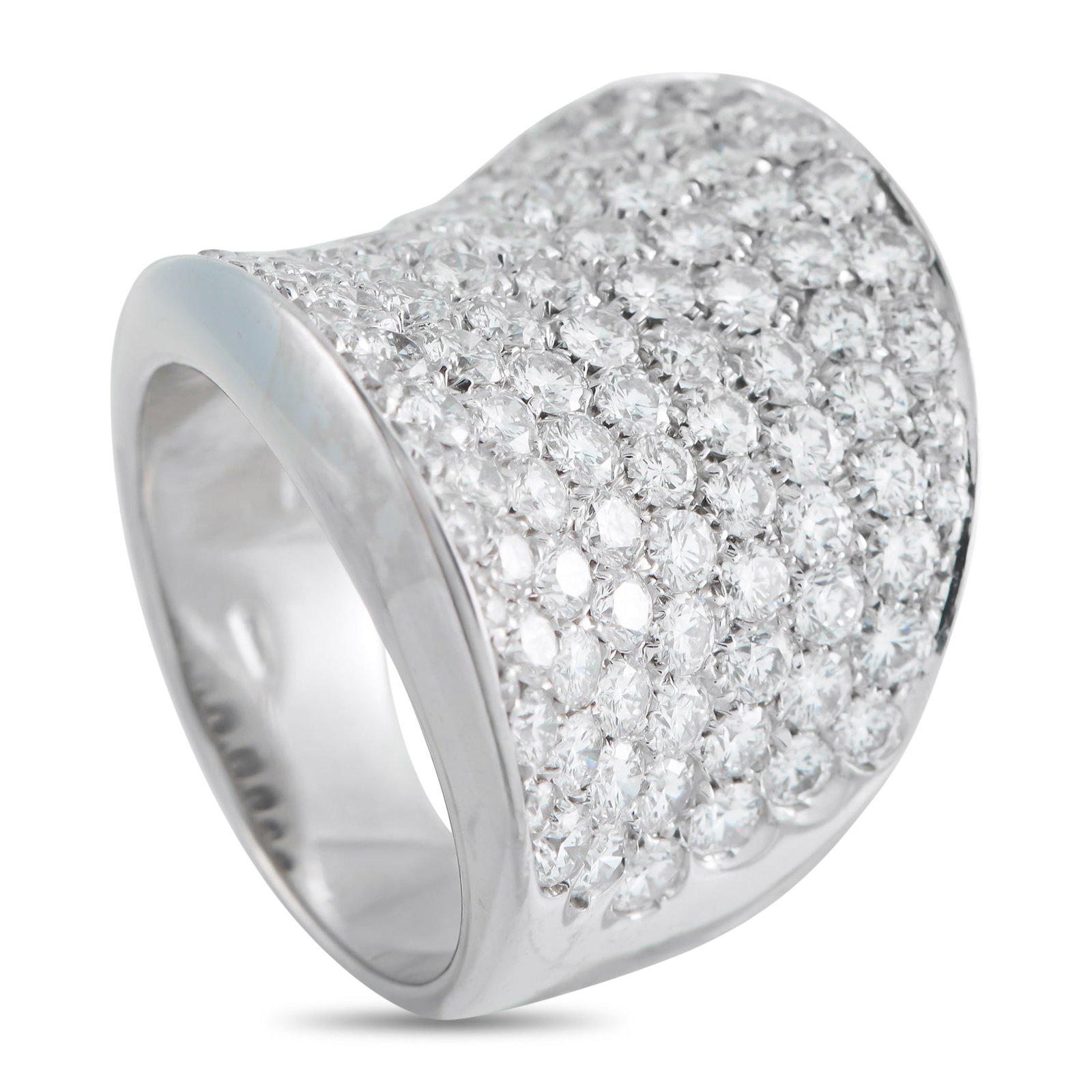 18K White Gold 5.60ct Diamond Ring: A curved setting crafted from 18K White Gold sets the stage for this impressive luxury ring. Bold and confident in design, Diamonds with a total weight of 5.60 carats allow it to continually catch the