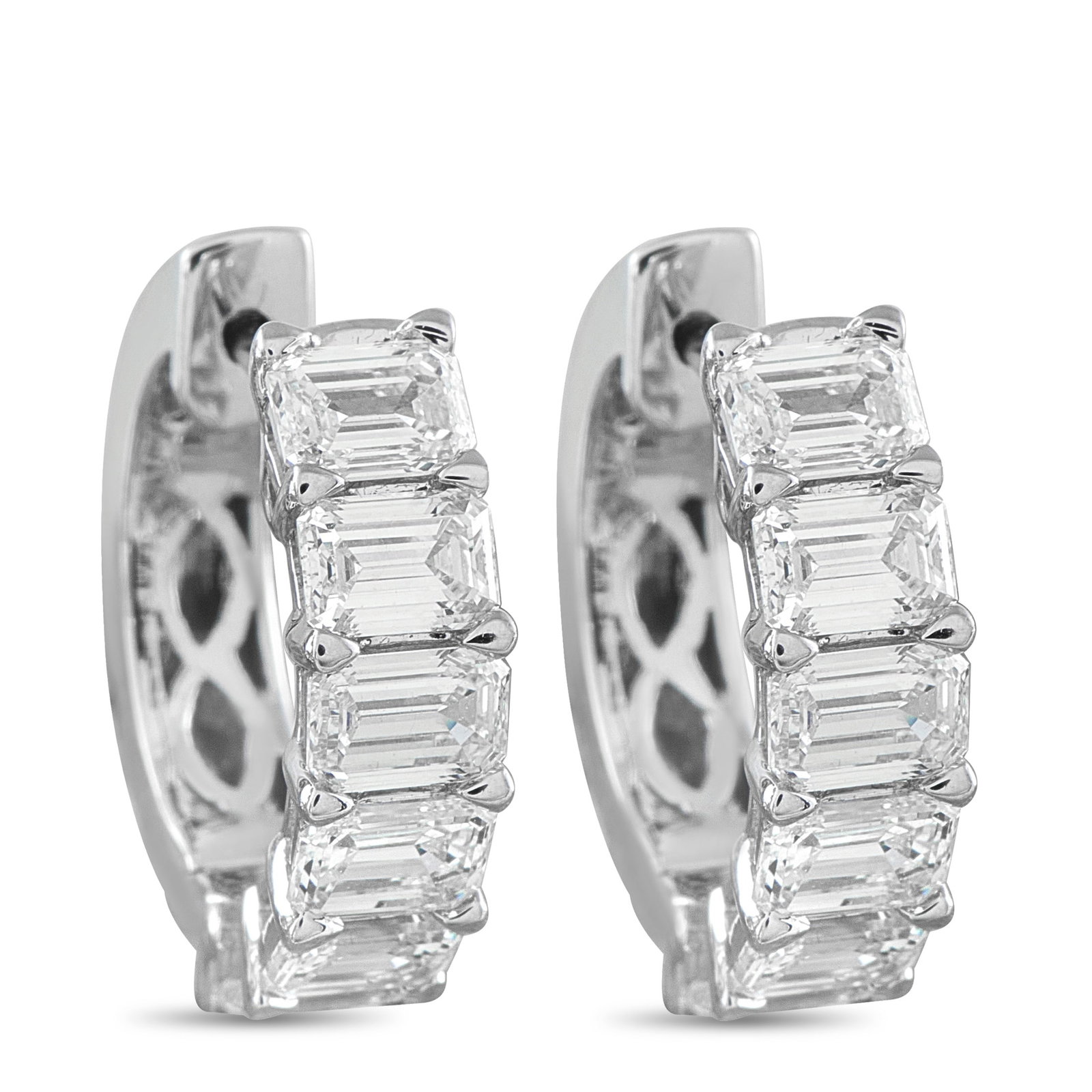 18K White Gold 3.01ct Diamond Hoop Earrings: Diamonds with a total weight of 3.01 carats make these earrings an elegant addition to any ensemble. Set in 18K White Gold, each earring measures 0.63” round. This jewelry piece is offered in br