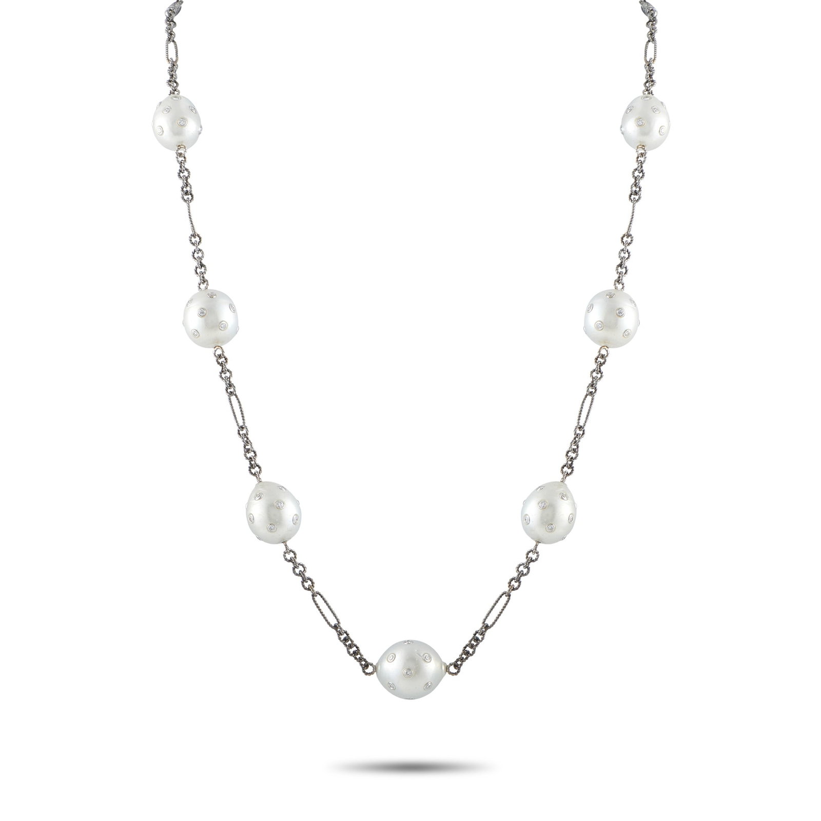 14K White Gold 4.46ct Diamond and Pearl Necklace: A uniquely elegant design makes this luxury necklace simply unforgettable. An intricate 14K White Gold chain measuring 21” long provides the perfect foundation for this dynamic accessory. Featur