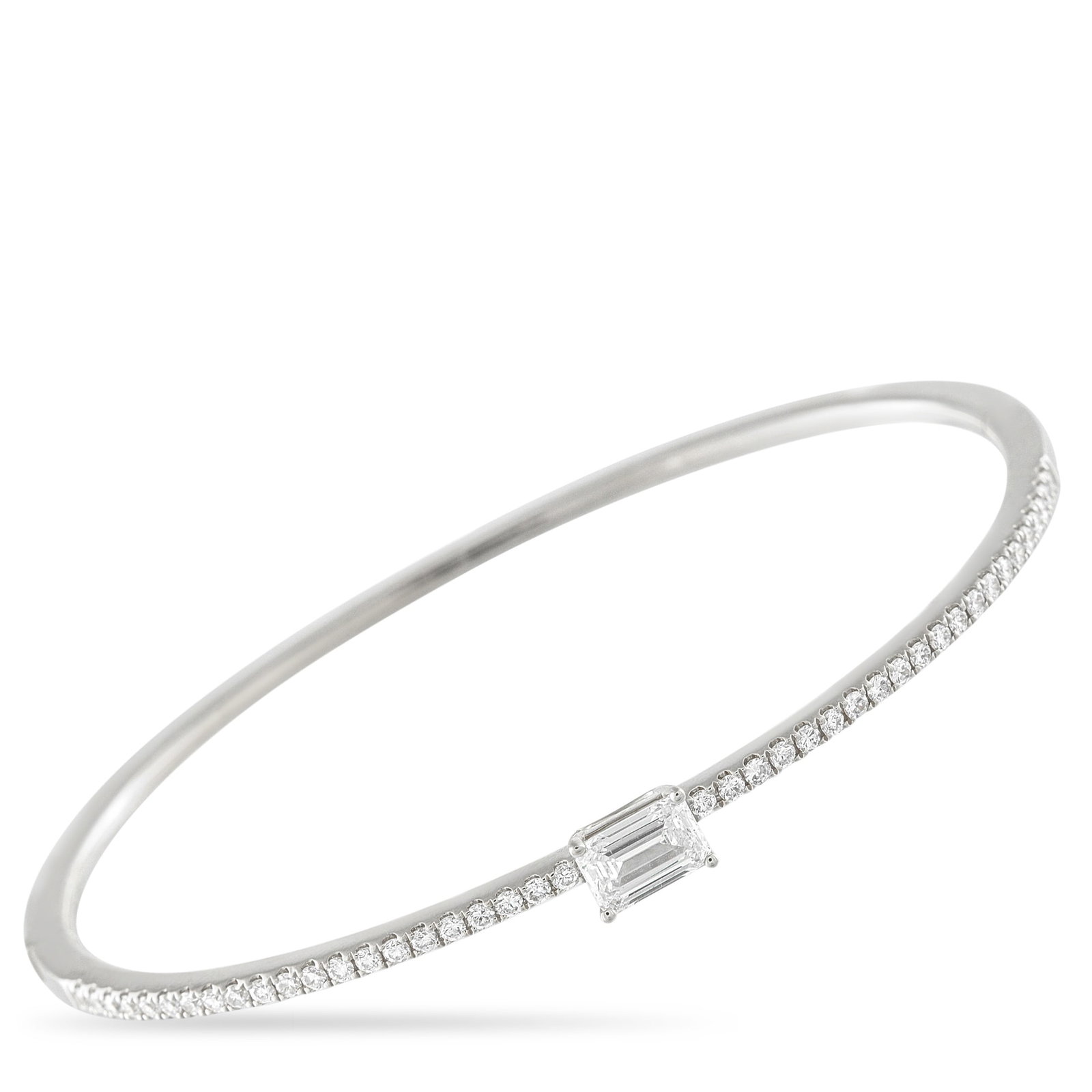 18K White Gold 1.30ct Diamond Bangle: Here is a diamond jewelry that fits into your routine as naturally as your favorite shirt. Crafted in 18K white gold, the slim bangle is defined by a front arc of petite round diamonds. At its center 