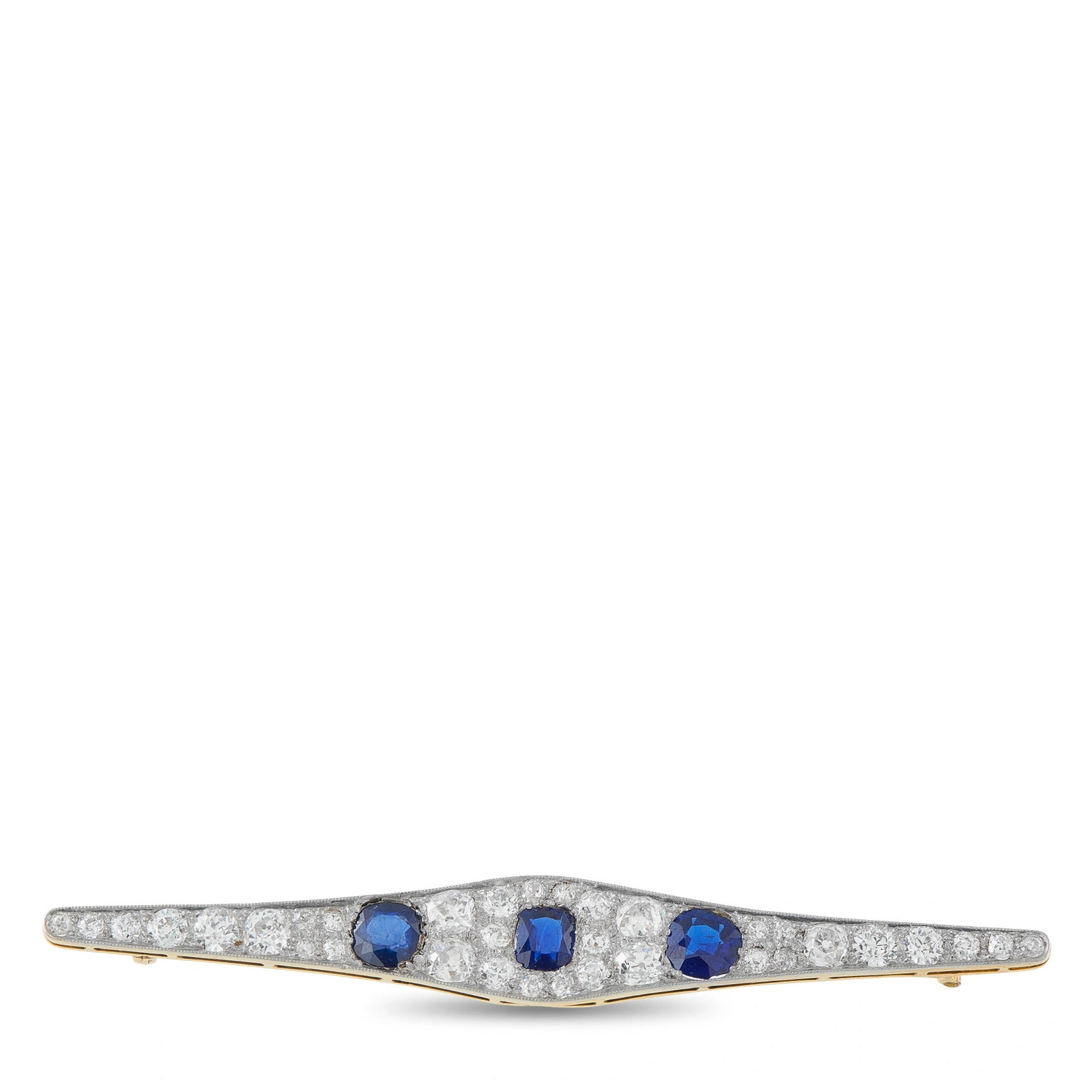 18K Yellow Gold 2.70ct Diamond and Sapphire Brooch: A magnificent antique bar brooch in 18K yellow gold, featuring three cushion-cut blue sapphires totaling 2.0 ct set within a sweeping navette of old mine-cut diamonds totaling 2.70 ct. The elongated p