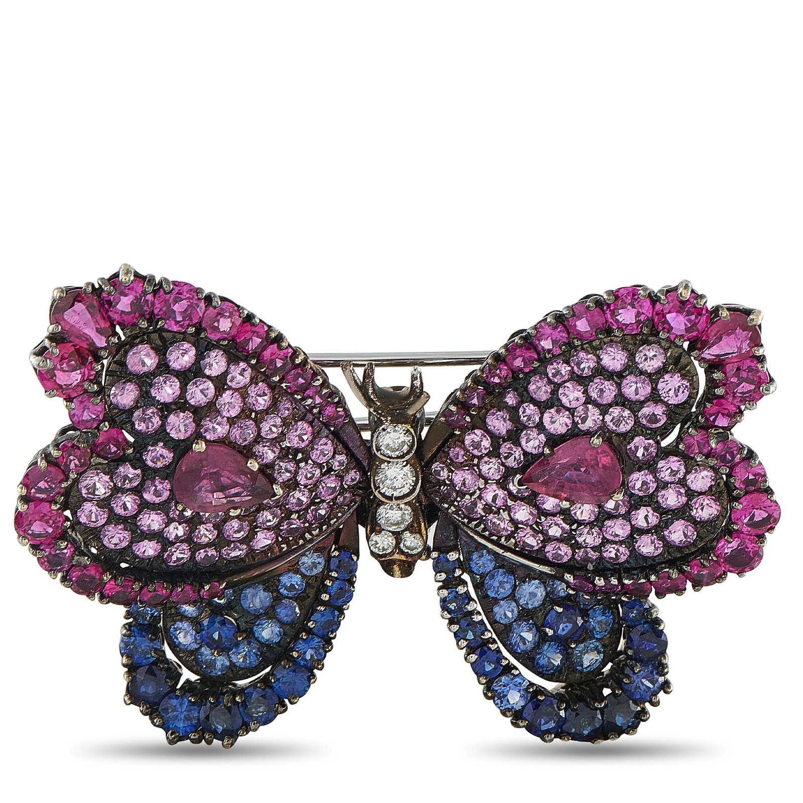 18K White Gold and Silver 0.40ct Diamond, Ruby, and Sapphire Butterfly Brooch: A breathtaking estate butterfly brooch, this piece showcases an extraordinary 14.00 carats of rubies and sapphires set across magnificently detailed wings crafted in blackened silver and 18K white gol