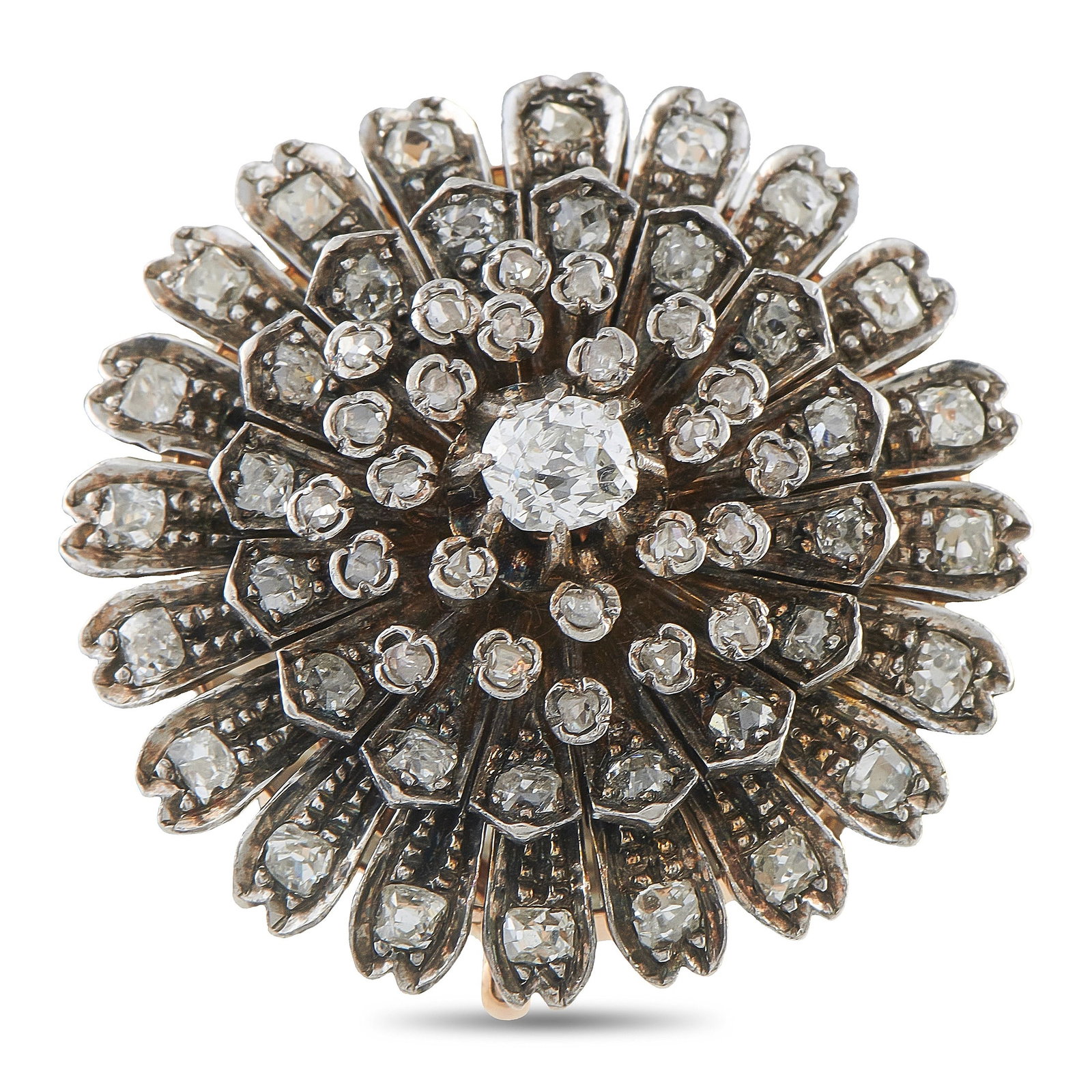 14K Rose Gold and Silver Diamond Starburst Brooch: A breathtaking antique 14K rose gold and silver diamond starburst brooch, radiating old-world grandeur in every direction. The large circular design features an old European cut diamond at the center 