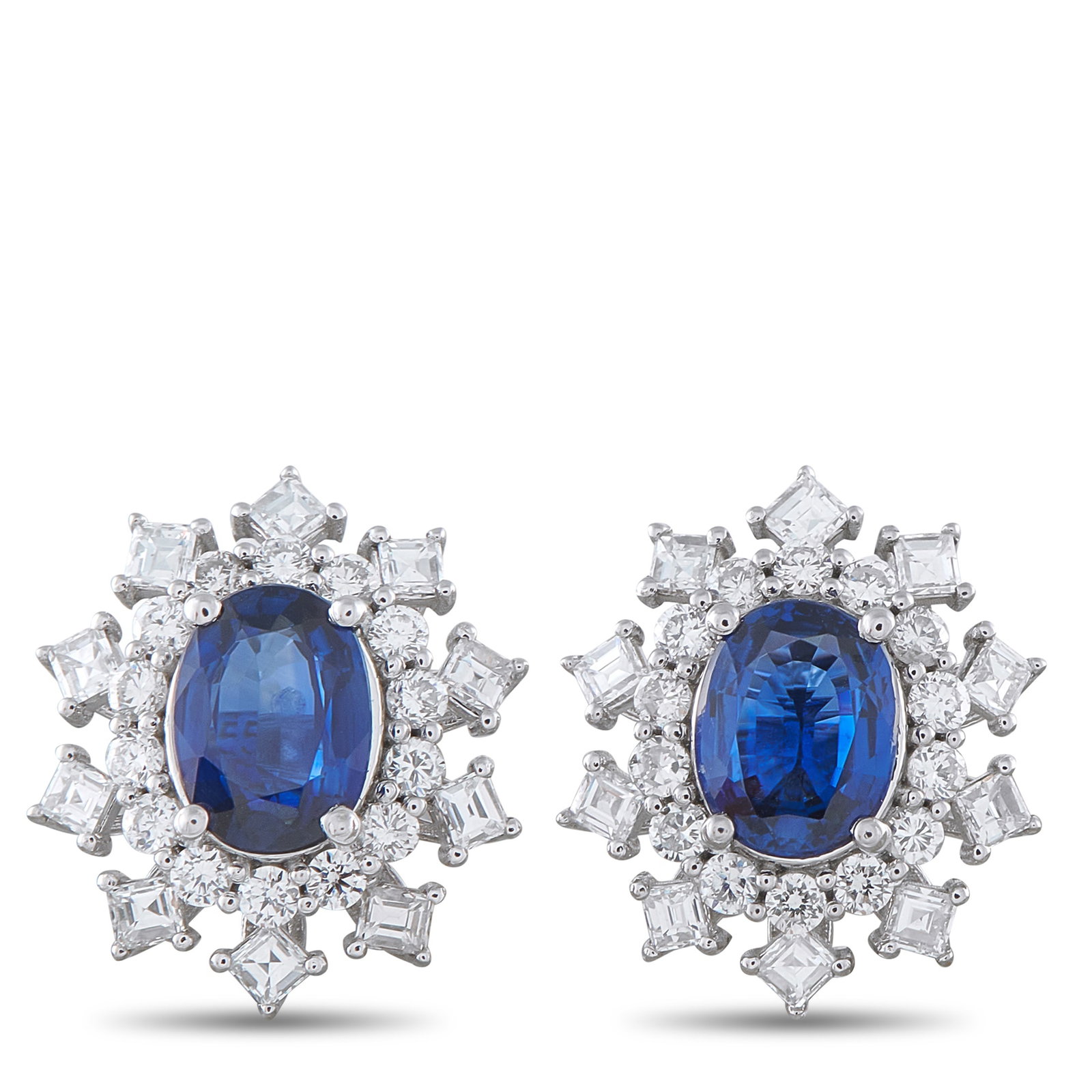 Platinum 1.19ct Diamond and Sapphire Earrings: These elegant earrings offer timeless luxury. The classic design features Sapphires totaling 2.23 carats surrounded by Diamonds totaling 1.19 carats. Ideal for any occasion, each one is crafted from P
