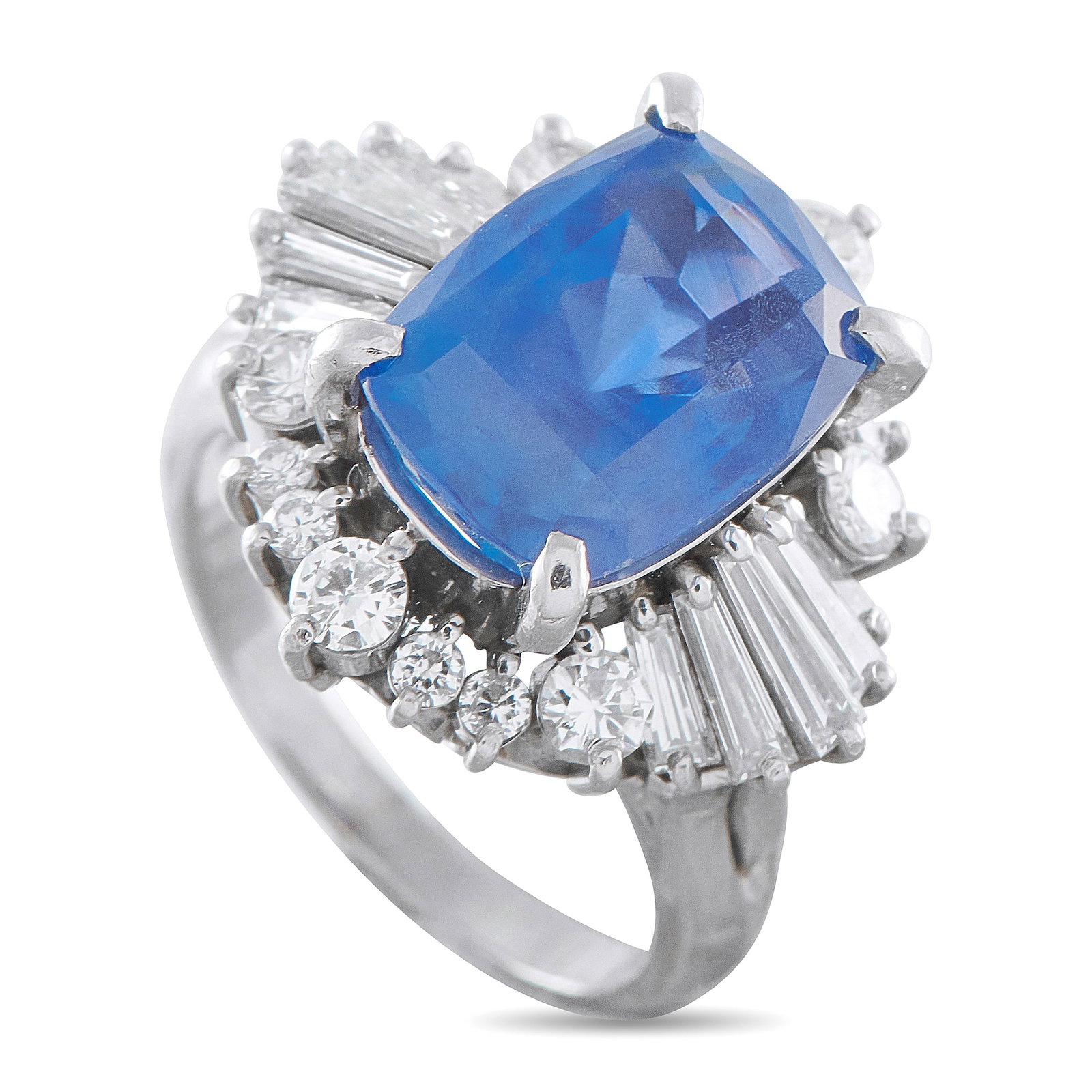 Platinum 1.11ct Diamond and Sapphire Ring: A detailed Platinum setting fills this ring with dramatic details. At the center, a vibrant 6.49 carat Sapphire adds a stylish pop of color to the overall design. Diamonds totaling 1.11 carats provide