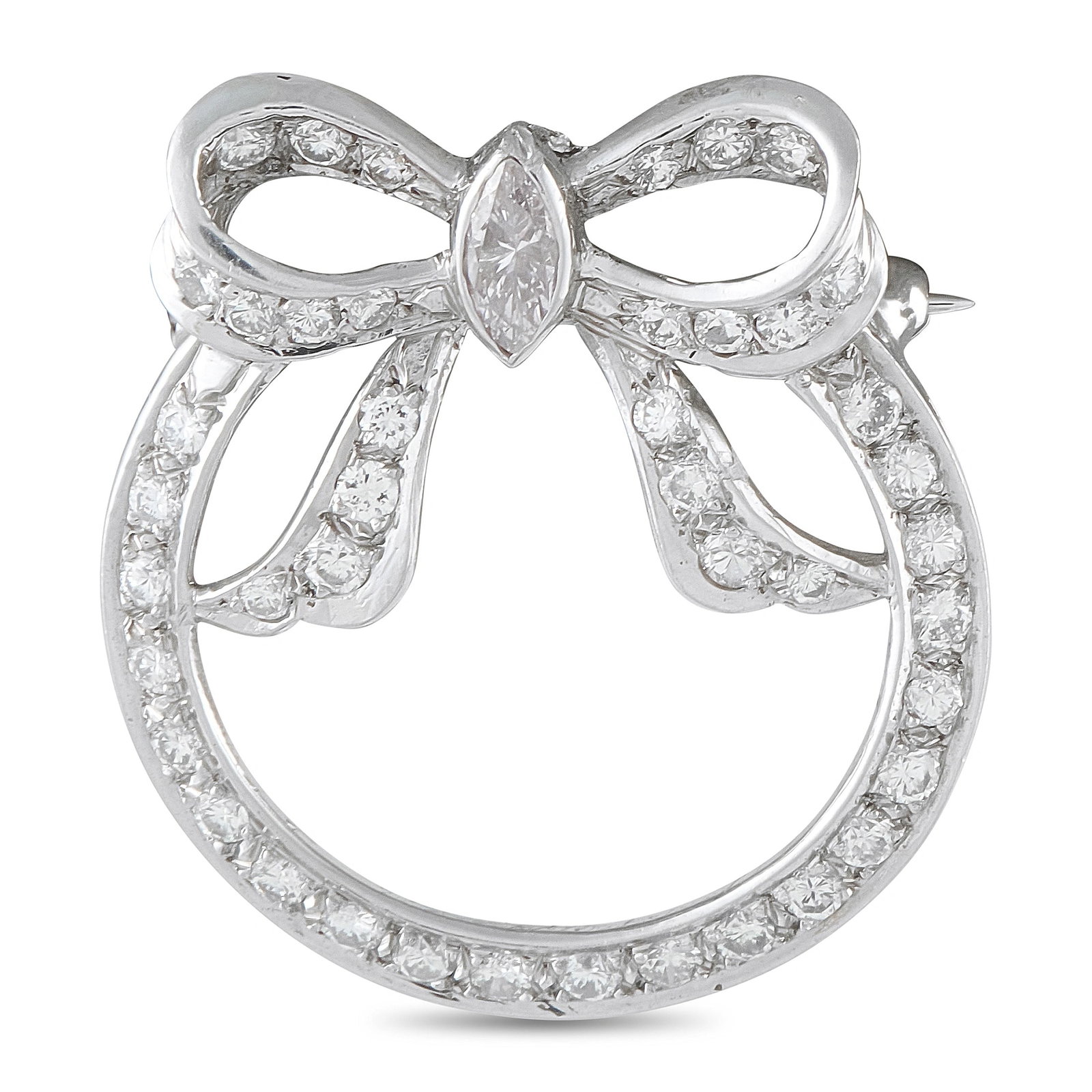 Platinum 1.20ct Diamond Circular Bow Brooch: This classic brooch is endlessly charming. A ladylike bow puts the perfect finishing touch on the circular Platinum setting. Sparkling Diamonds with a total weight of 1.20 carats allow it to come aliv