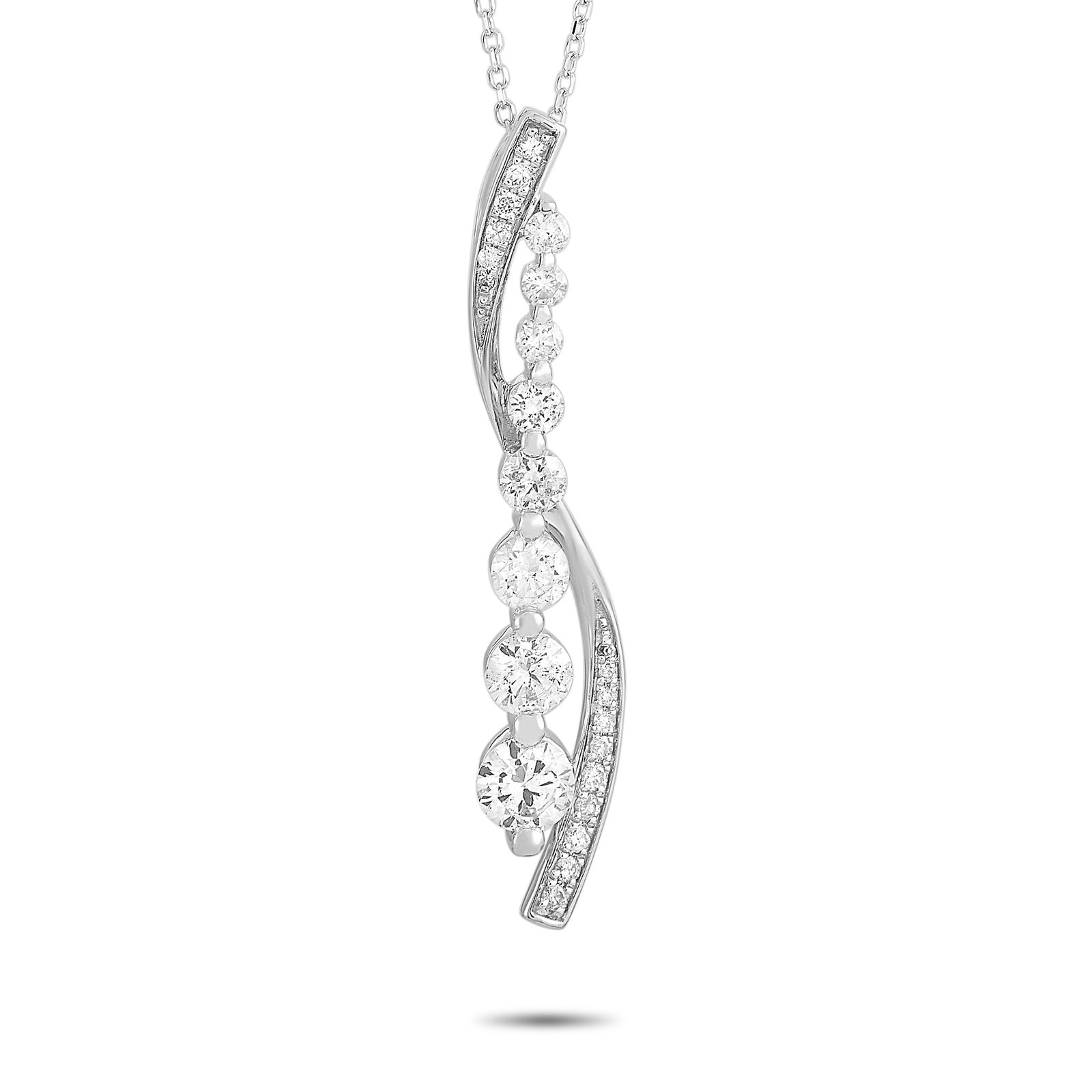 14K White Gold 1.0ct Diamond Necklace: This necklace is crafted from 14K white gold and weighs 3.3 grams. It is presented with a 16” chain and a pendant that measures 1.50” in length and 0.37” in width. The necklace is em