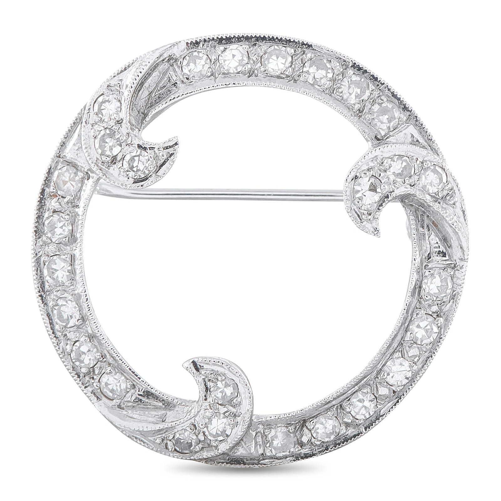 14K White Gold 0.60ct Diamond Brooch: A graceful estate brooch in 14K white gold, this open circle design is set throughout with 0.60 carats total weight of round brilliant diamonds, accented by delicate scrolled foliate flourishes at the