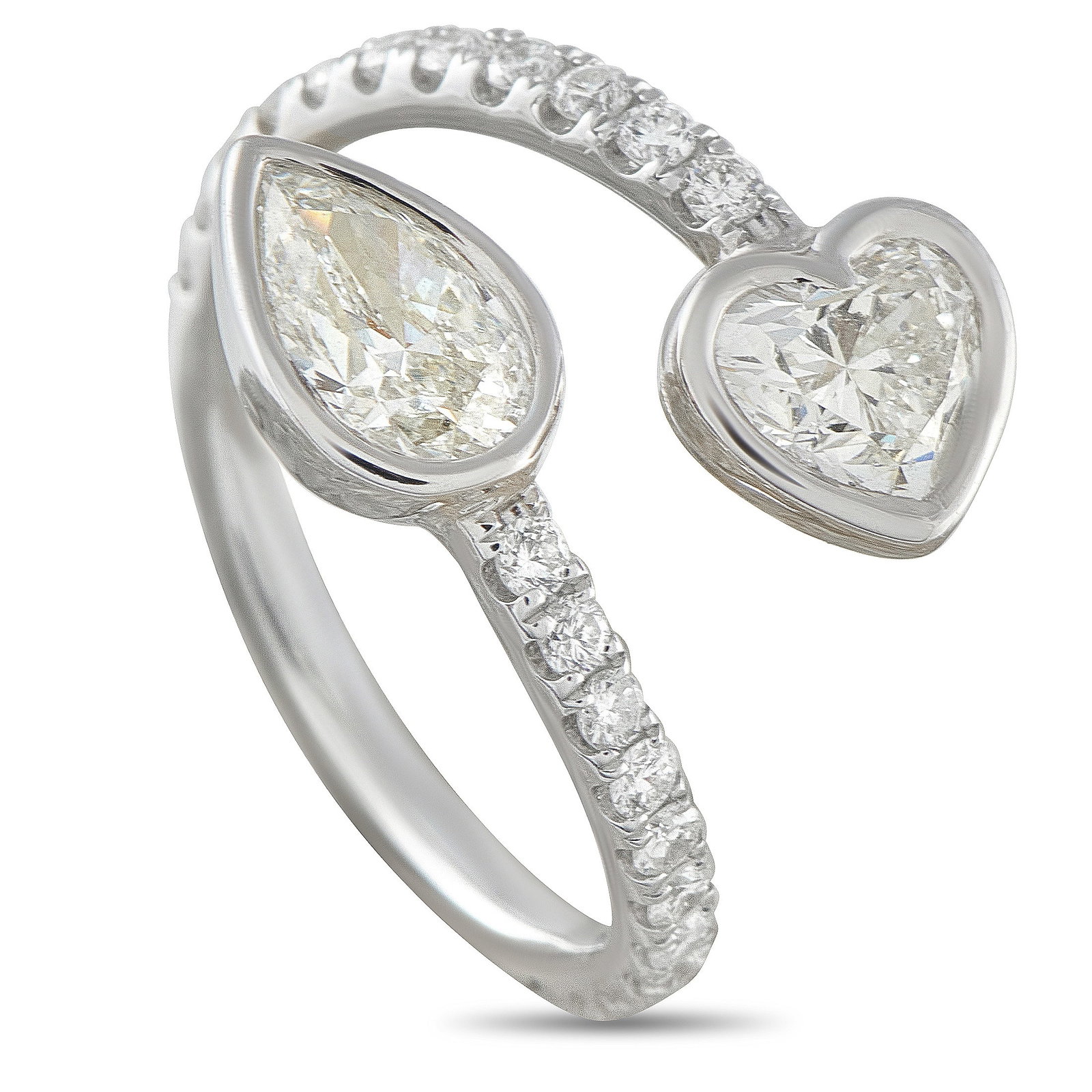 18K White Gold 1.90ct Diamond Bypass Ring: This bypass ring will instantly capture your imagination. Set in 18K White Gold, a pear-shaped Diamond and a heart-shaped Diamond totaling 1.45 carats make a statement at each end of the design. Diamo