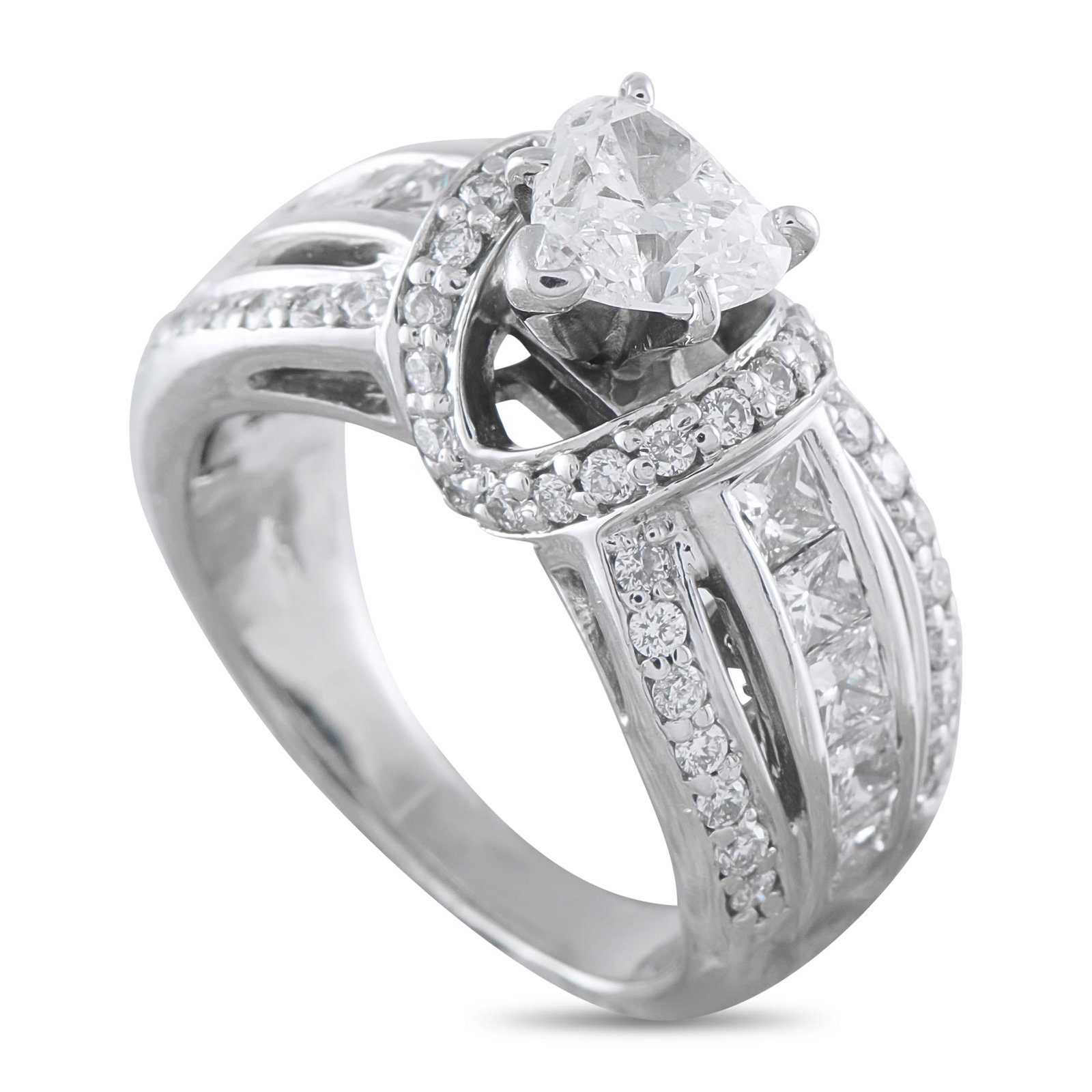 14K White Gold 2.20ct Diamond Ring: This luxury ring is filled with dynamic details. The intricate 14K White Gold setting comes to life thanks to Diamond accents totaling 0.90 carats. At the center, a 1.30 carat heart-shaped Diamond add