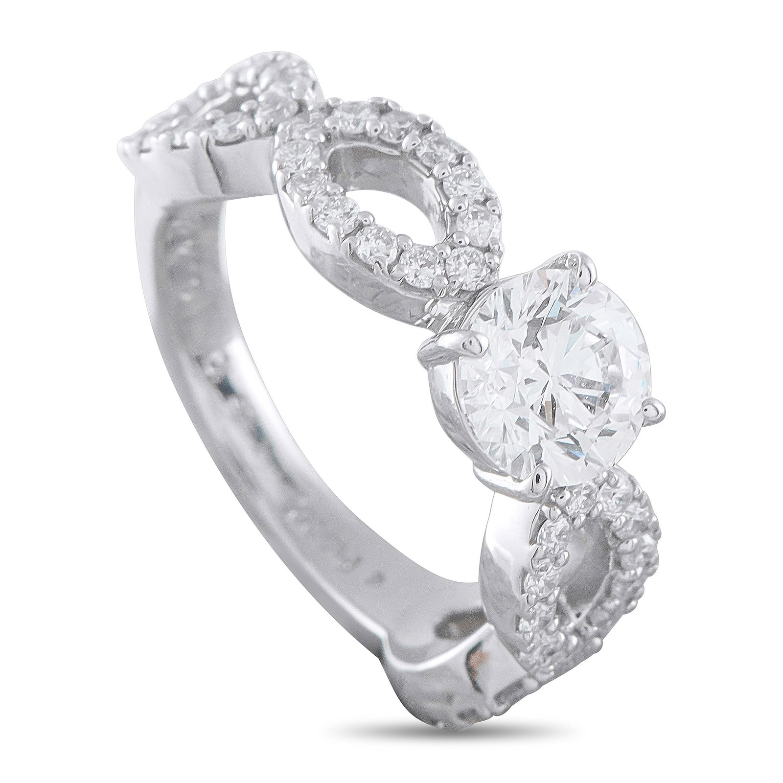 Platinum 1.43ct Diamond Ring: This luxury ring is filled with dramatic details. A 1.0 carat round-cut Diamond makes a sparkling statement at the center. The detailed infinity band is elevated by additional Diamond accents totaling