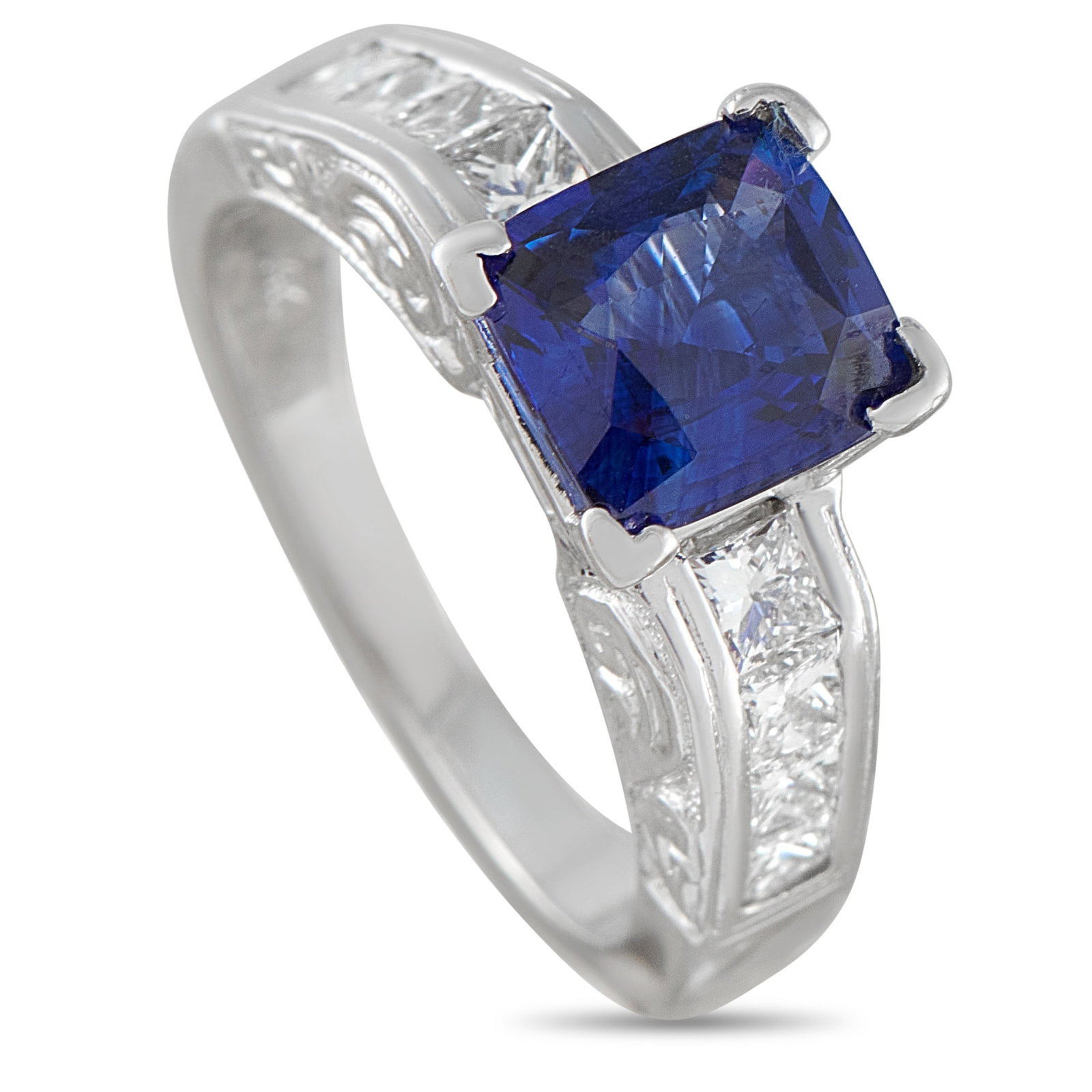 14K White Gold 0.80ct Diamond and Sapphire Ring: Intricate metalwork makes this luxury ring breathtaking from every angle. Crafted from 14K White Gold, the stunning setting showcases the 1.23 carat Sapphire center stone and Diamond accents totaling