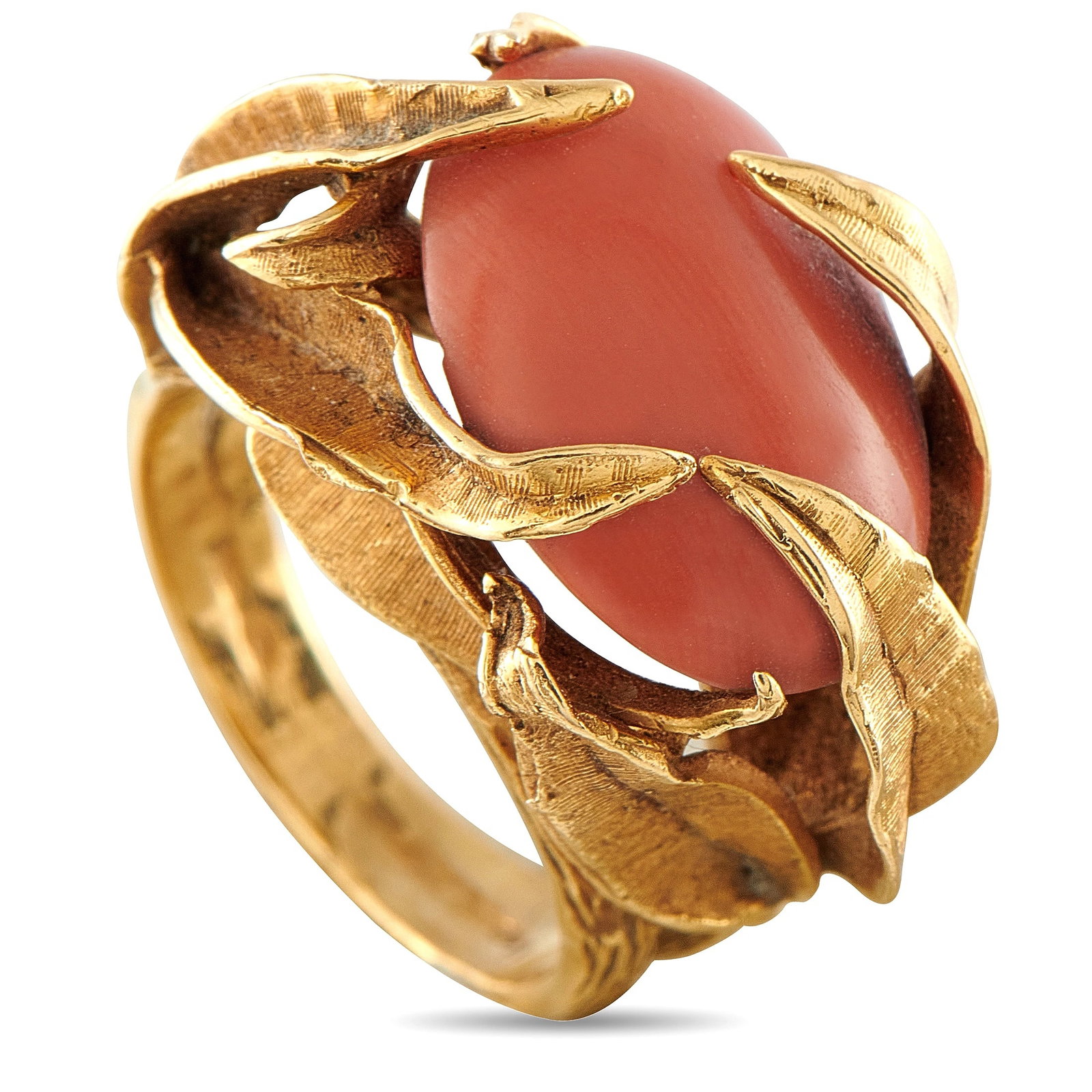 Antique 18K Yellow Gold Coral Cabochon Sculptural Leaf Motif Ring: A bold and organic antique cocktail ring in 18K yellow gold, centering a large oval coral cabochon held within a sculptural open-work mounting of textured, overlapping leaf and claw forms in matte and