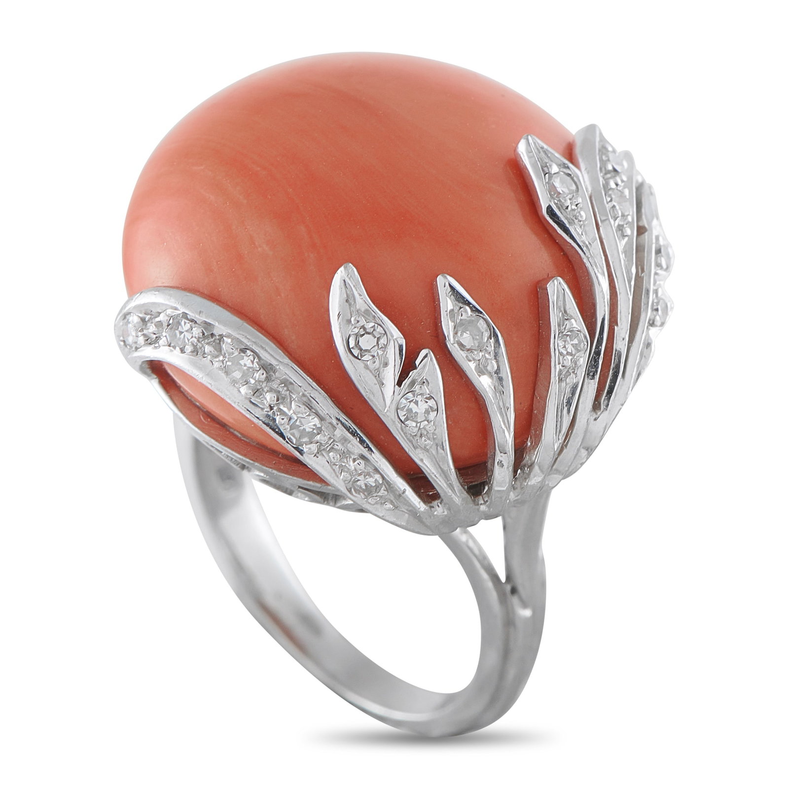 18K White Gold 0.10ct Diamond and Coral Ring: A stunning asymmetrical design makes this ring simply unforgettable. Set in 18K White Gold, the dynamic setting extends onto the face of the Coral center stone and is elevated by Diamond accents total