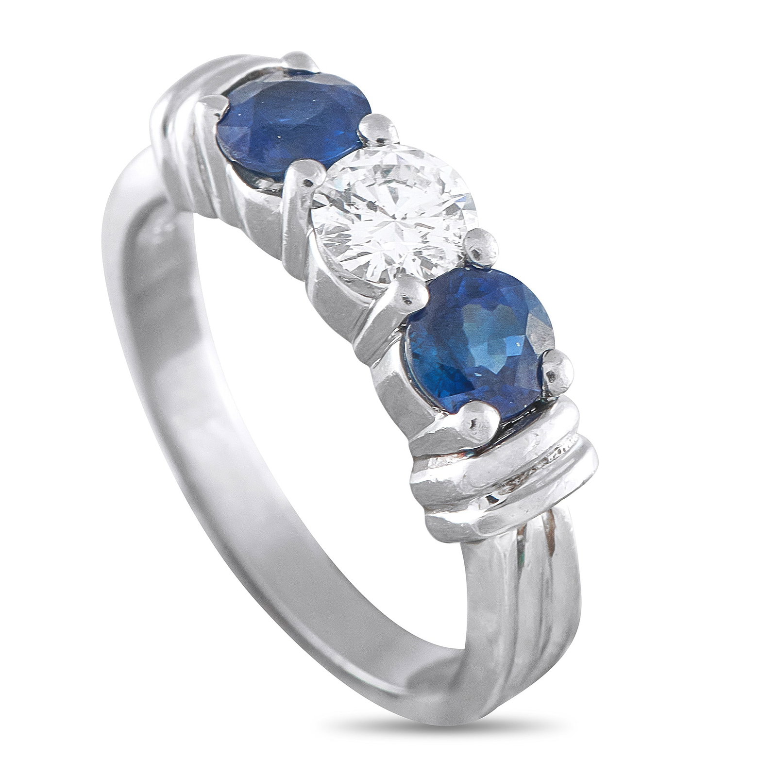 Platinum 0.55ct Diamond and Sapphire Ring: An elegant, understated design makes this luxury ring ideal for everyday wear. A 0.55 carat Diamond serves as a stunning focal point, while Sapphires with a total weight of 1.30 carats provide a styli