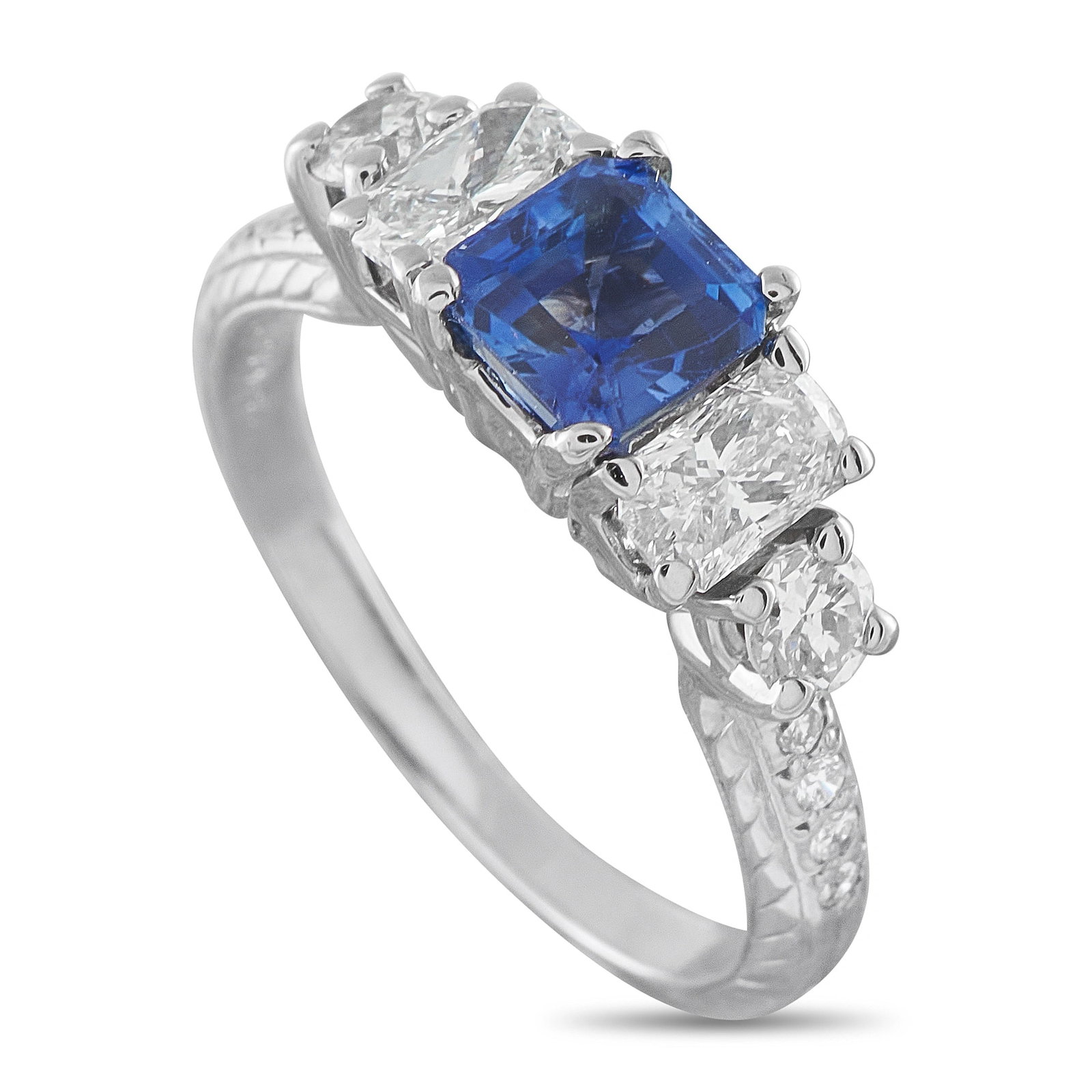 14K White Gold 0.80ct Diamond and Blue Sapphire Ring: An elegant 14-karat white gold three-stone ring centering a richly saturated blue sapphire of approximately 1.09 carats, flanked by two radiant-cut diamond side stones. Additional round brilliant diam