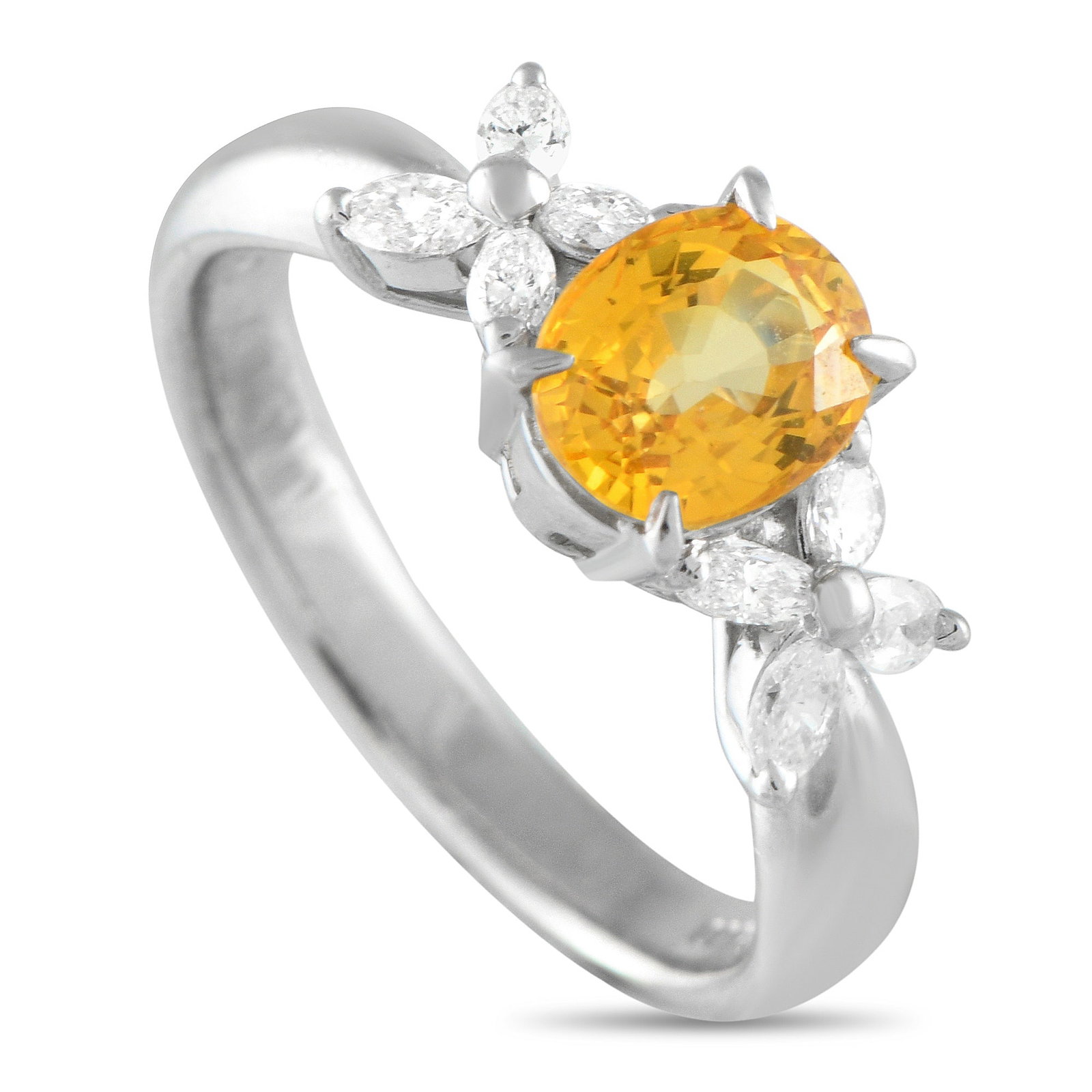 Platinum 0.30ct Diamond and Yellow Sapphire Ring: This simple, elegant ring will add the perfect touch of luxury to any ensemble. A 1.45 carat Yellow Sapphire center stone makes this piece instantly captivating, while Diamond accents totaling 0.30 ca