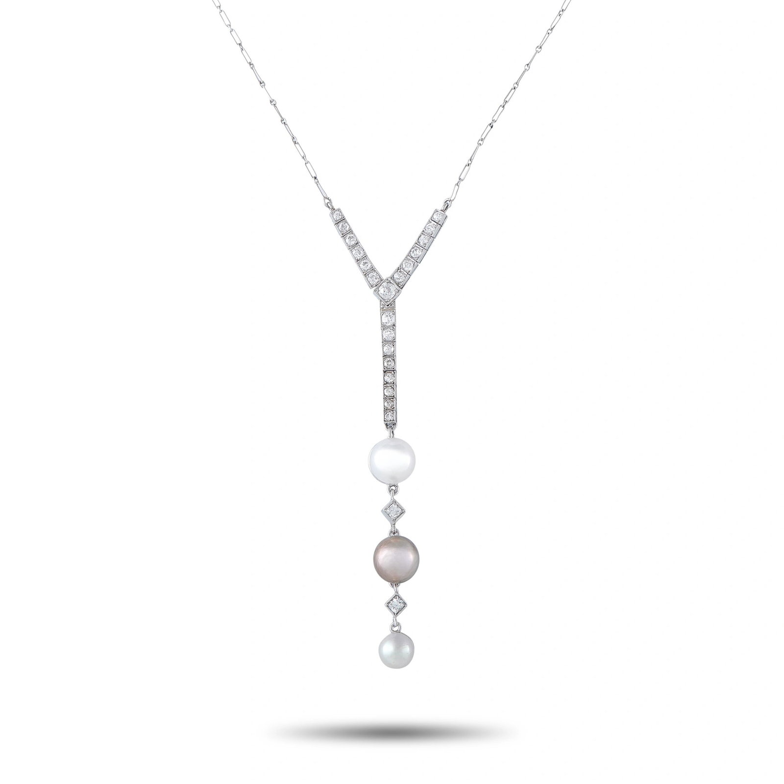 Platinum 18K White Gold 0.85ct Diamond and Pearl Vintage Pendant: This vintage French-style necklace is crafted in platinum with 18K white gold detailing, featuring a diamond-set Y-drop suspending three natural pearls in white and silvery-pink hues, separated by dia