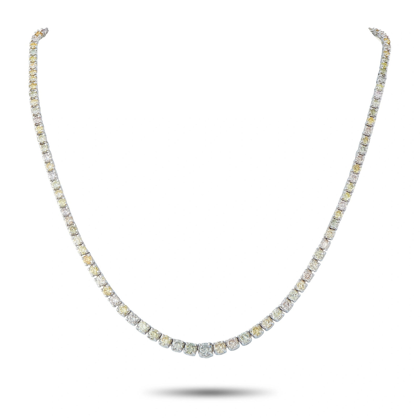 18K White Gold 11.0ct Fancy Color Diamond Tennis Necklace: This 18K white gold tennis necklace is set with approximately 11.0 carats total weight of natural fancy color round brilliant diamonds, displaying a graduated array of gray, light brown, and brown-pin
