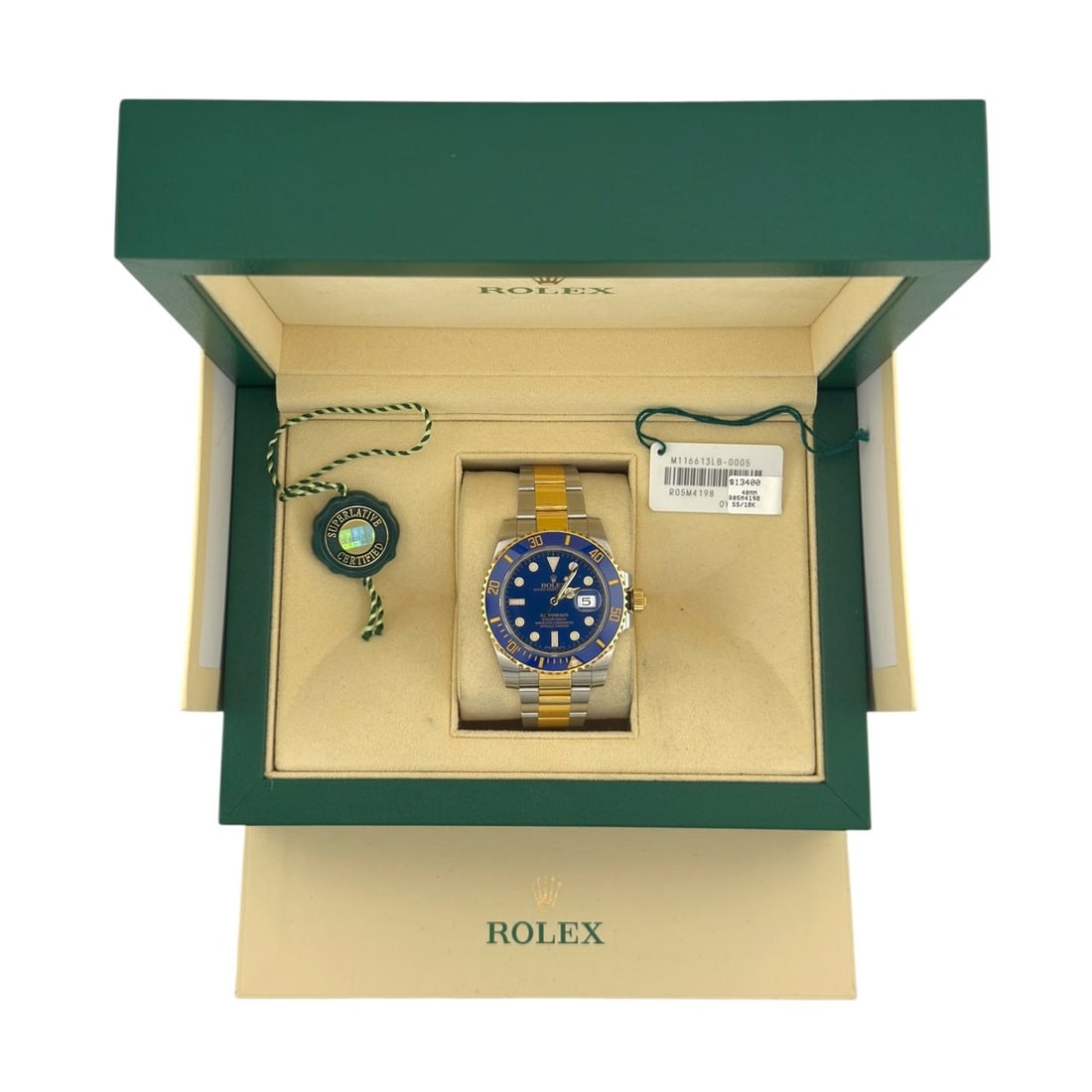 Rolex Submariner Date 116613LB Stainless Steel Yellow Gold Blue Dial "Bluesy" Year 2018 Watch: The Rolex Submariner Date 116613LB, affectionately known as the "Bluesy," masterfully combines robust functionality with luxurious design. Featuring a 40mm stainless steel case accented by 18k yellow