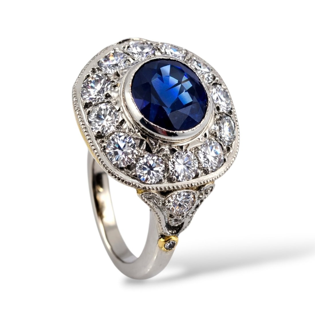 18K White Gold 3.5ct Diamond and 3ct Sapphire Art Deco Ring: 18k White Gold 3.5ct Diamond and 3.0ct Sapphire Art Deco Ring An elegant Art Deco ring crafted in 18K white and yellow gold, showcasing a striking royal blue sapphire surrounded by brilliant natural d