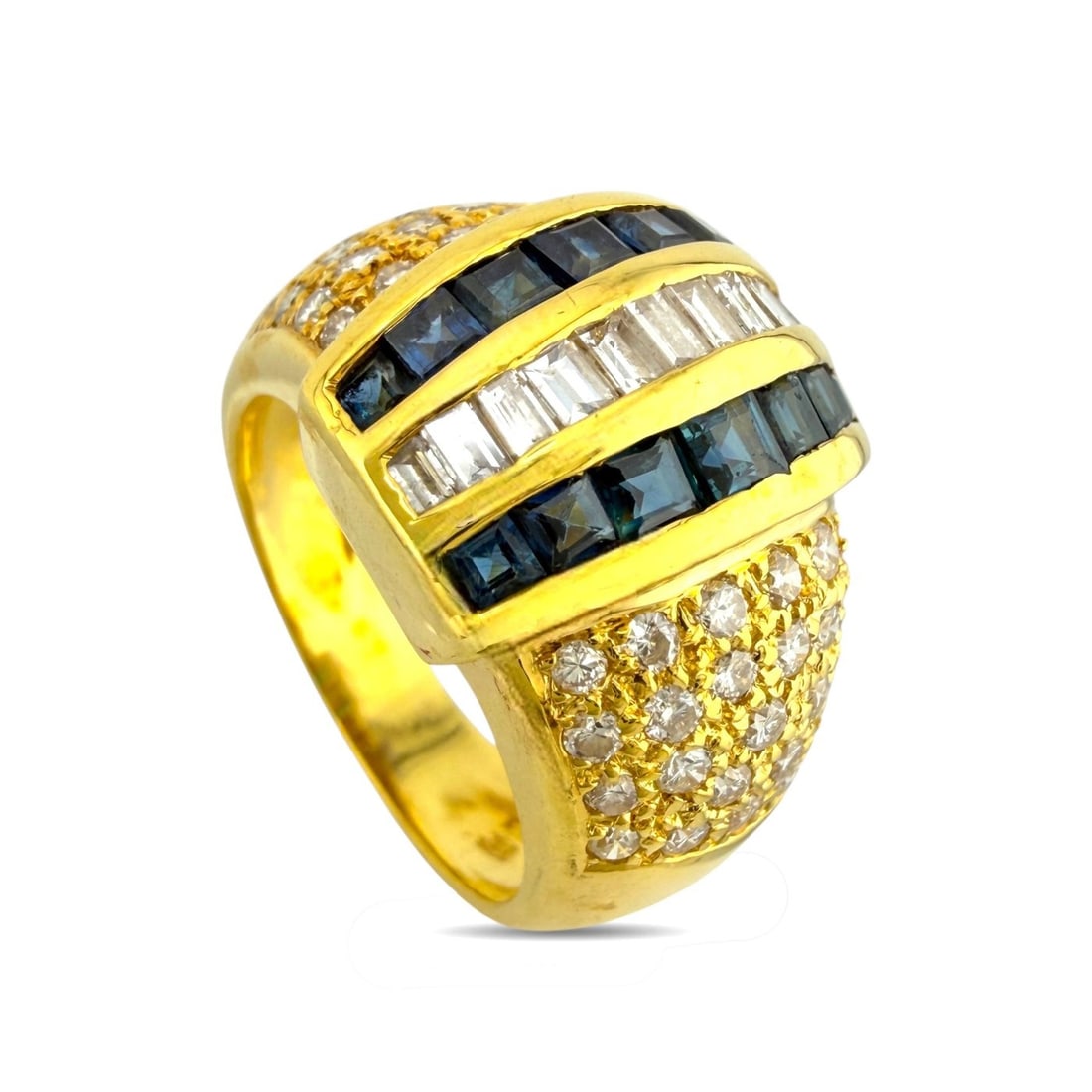 18K Yellow Gold and 1.0ct Diamond Ring: 18K Yellow Gold 1.0ct Diamond and 0.84ct Sapphire Ring A beautifully composed rings crafted in 18 karat yellow Gold, designed with a central row of rectangular cut diamonds framed by two rows of squar