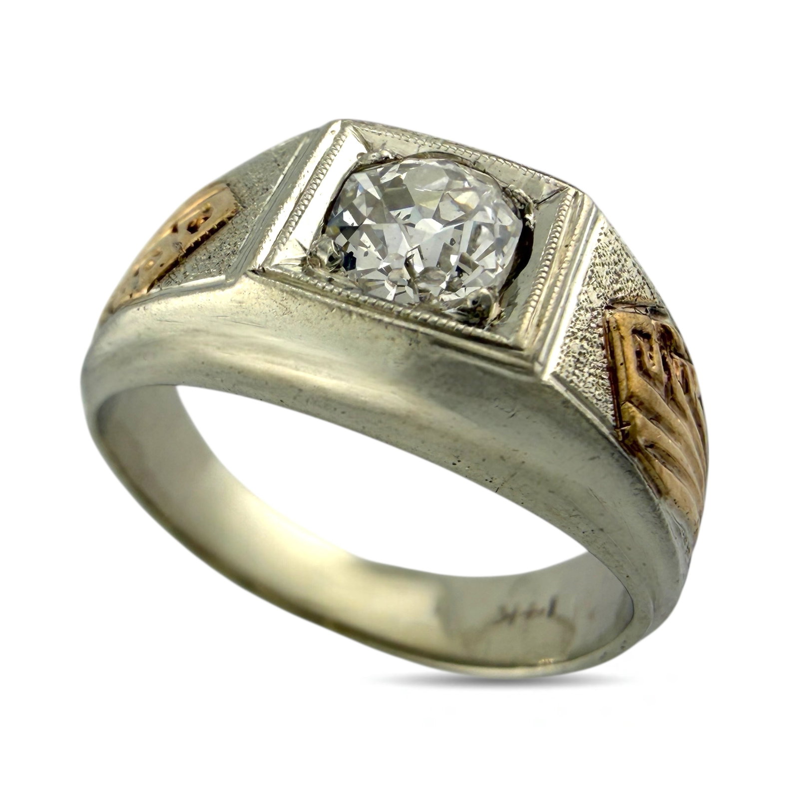 14K White and Rose Gold 0.55ct Diamond Ring: 14K White and Rose Gold 0.55ct Diamond Ring with Prominent Center Stone This refined ring is crafted in a two tone combination of 14 karat white and rose gold, offering subtle contrast and visual