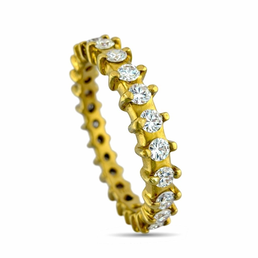 18K Yellow Gold 0.72ct Diamond Eternity Band: 18K Yellow Gold 0.72ct Diamond Eternity Band Ring A refined and elegant 18 karat yellow gold band fully adorned with brilliant round diamonds encircling the entire ring. The continuous sparkle