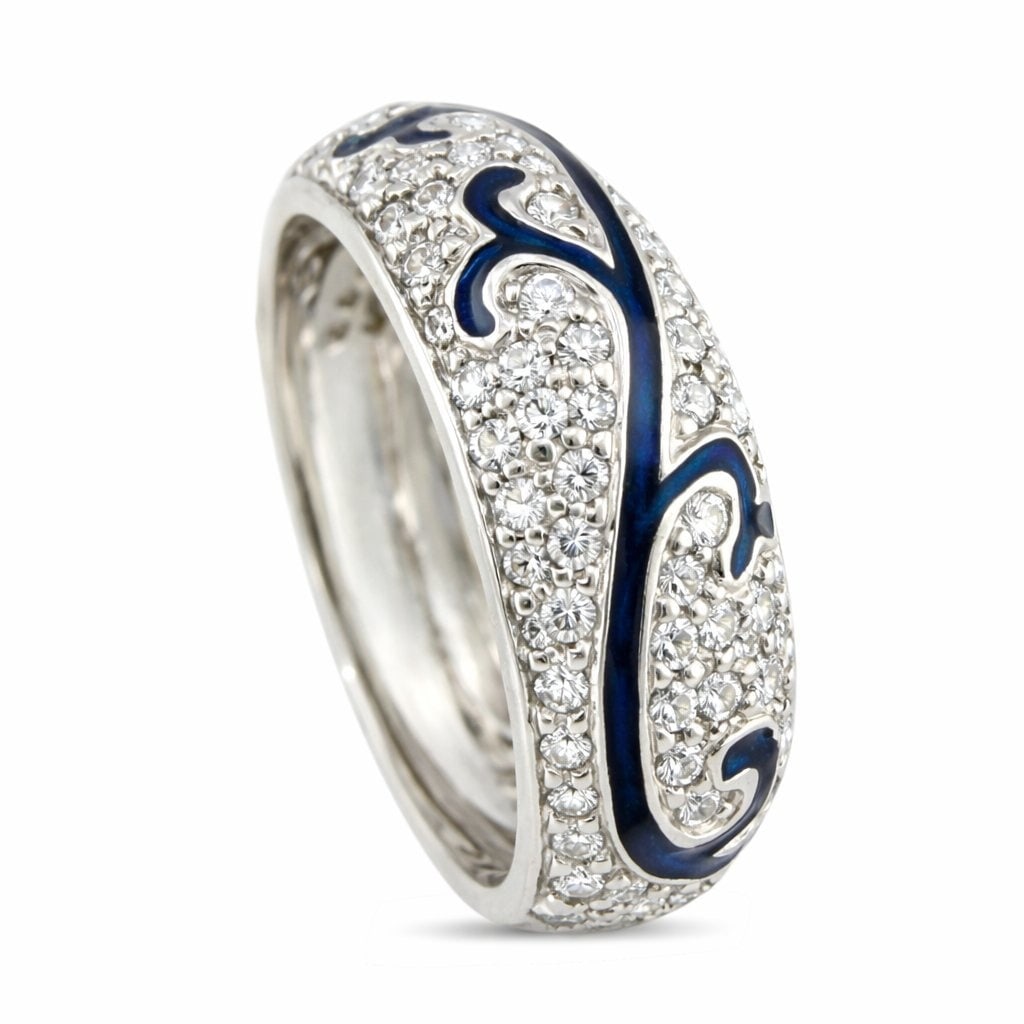 Hidalgo 18K White Gold 0.4ct Diamond and Blue Enamel Band: Hidalgo 18K White Gold 0.4ct Diamond and Blue Enamel Band Ring A refined and distinctive band by Hidalgo, crafted in luminous 18 karat white gold. The ring features elegant blue enamel streaks