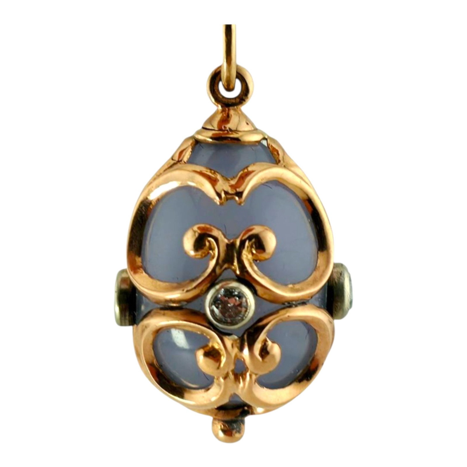 Faberge Imperial Russian 56K (14K) Yellow Gold and Diamond Egg Pendant: Faberge Imperial Russian 56K (14K) Yellow Gold and Diamond Egg Pendant This refined Faberge egg pendant is crafted in warm 14K yellow gold and set with four bright natural diamonds. It was made by Fab