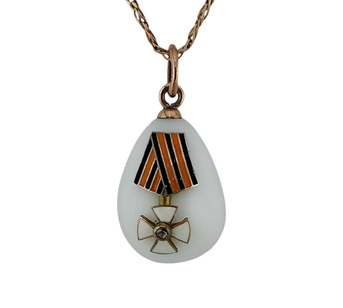 Imperial Russian Period 56K (14K) Gold Enamel Military Egg Pendant: Faberge head master August Hollming Imperial Russian 56 Gold Enamel Pendant Egg Circa 1880-1913 Marked. Imperial Russian 56k ( 14k gold) gold marks, city marks and initials A.H for K. Faberge Work Mas
