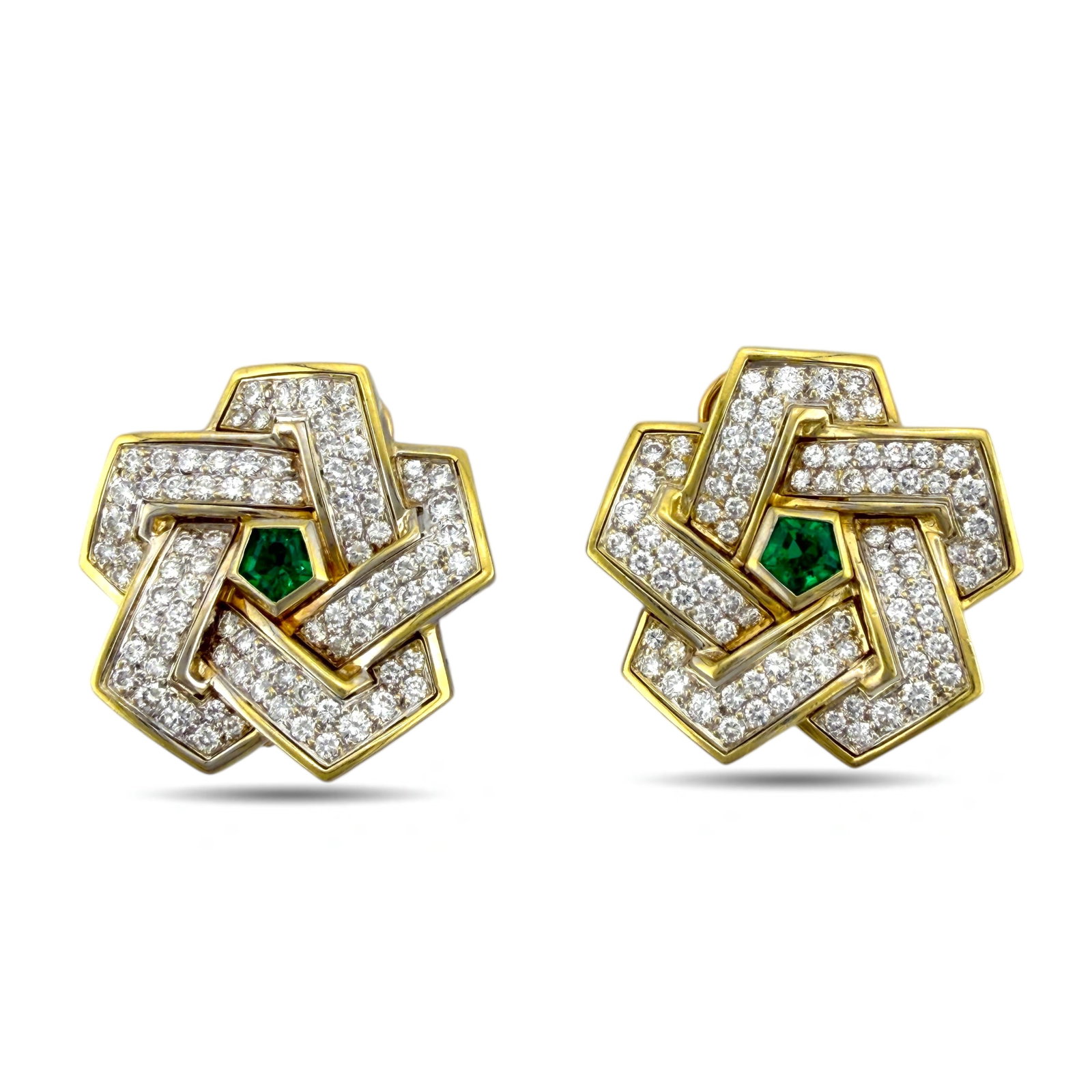 18K Yellow Gold Interlocking 7ct Diamond and Emerald Earrings: 18K Yellow Gold Interlocking 7ct Diamond and Emerald Earrings These elegant earrings feature an interlocking design that exudes sophistication and timeless style. Each piece is adorned with