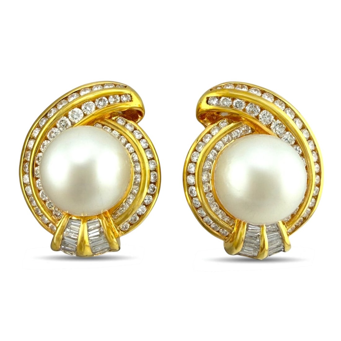 18K Yellow Gold 2.01ct Diamond and Pearl Earrings: 18K Yellow Gold 2.01ct Diamond and Pearl Earrings A bold and elegant pair of statement earrings with a graceful swirl motif. Crafted in rich yellow gold, each earring is centered by a luminous white