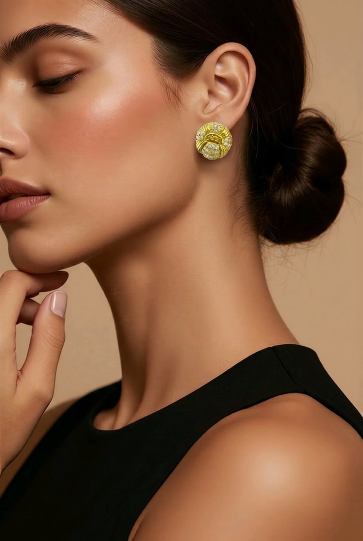 18K Yellow Gold 2.1ct Diamond and Yellow Sapphire Earrings: 18K Yellow Gold 2.1ct Diamond and Yellow Sapphire earrings A vibrant pair of round earrings crafted in 18 karat yellow Gold. The design is beautifully arranged with a richly set surface of diamonds ac