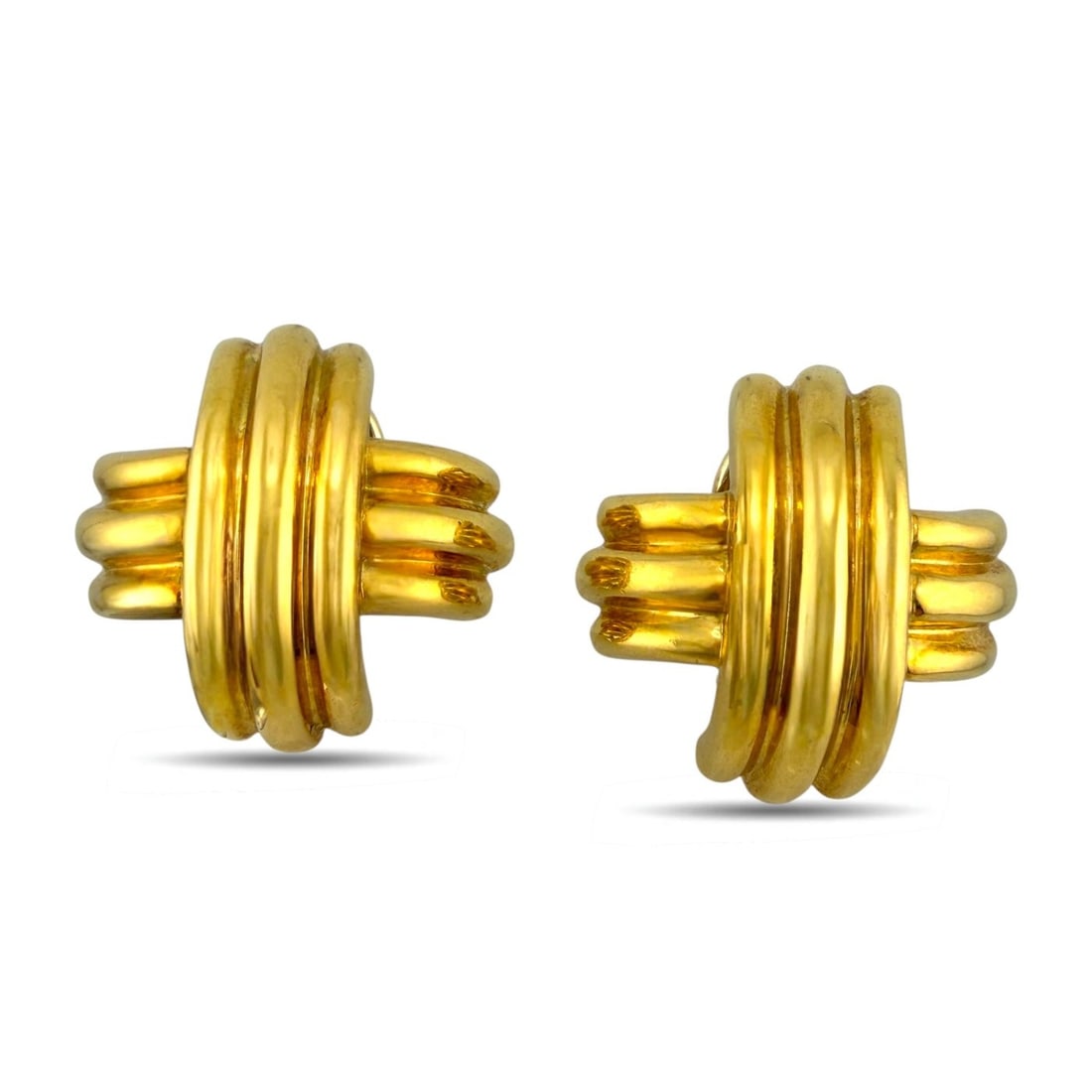 18K Yellow Gold Tiffany and Co. Cross Earrings: 18K Yellow Gold Tiffany and Co. Cross Earrings A bold and sculptural pair of earrings by Tiffany and Co. crafted in rich 18 karat yellow gold. The design features intersecting gold strands forming a s