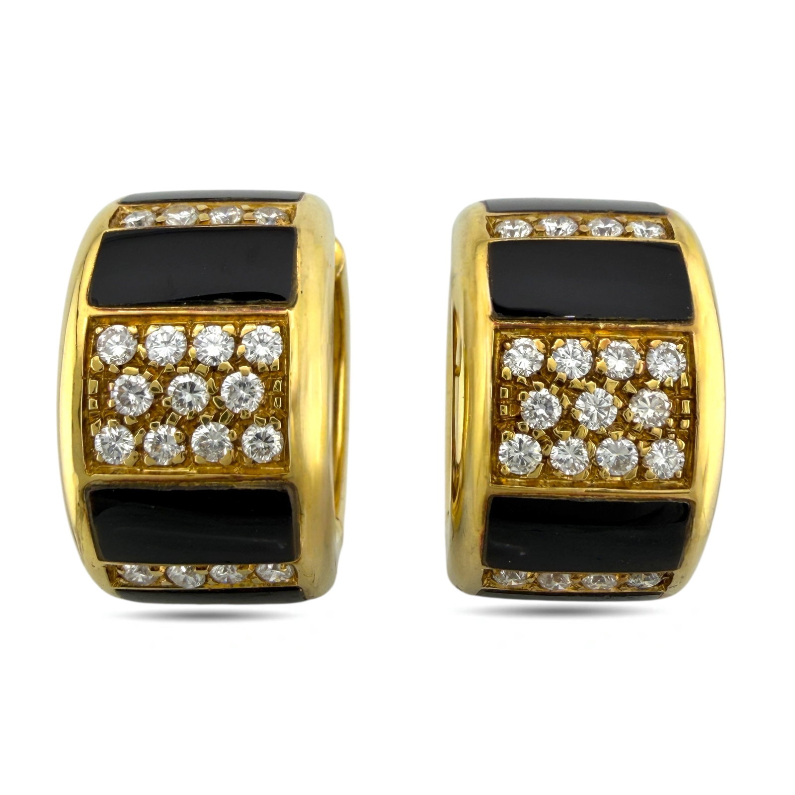 18K Yellow Gold 0.76ct Diamond and Black Enamel Hinged Huggy Earrings: 18K Yellow Gold 0.76ct Diamond and Black Enamel Hinged Huggy Earrings These chic hinged huggy earrings feature a classic circular design accented with black enamel and sparkling diamonds. Their versat