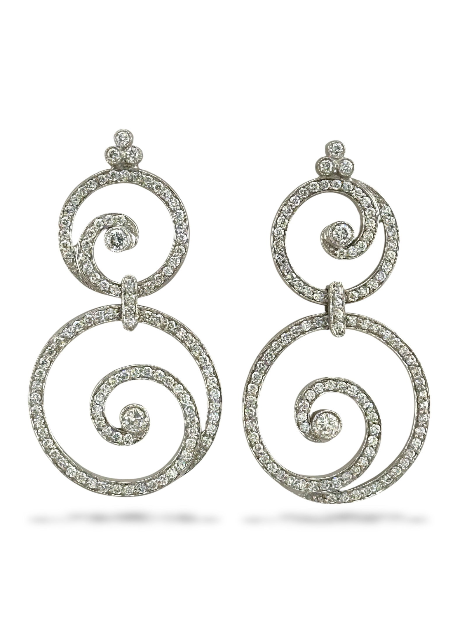 18K White Gold Circular 3.48ct Diamond Earrings: 18K White Gold Circular Earrings with 1.74 Carats of Diamonds These elegant earrings are crafted in 18K white gold and showcase a refined circular design. Each earring features two interlocking circle
