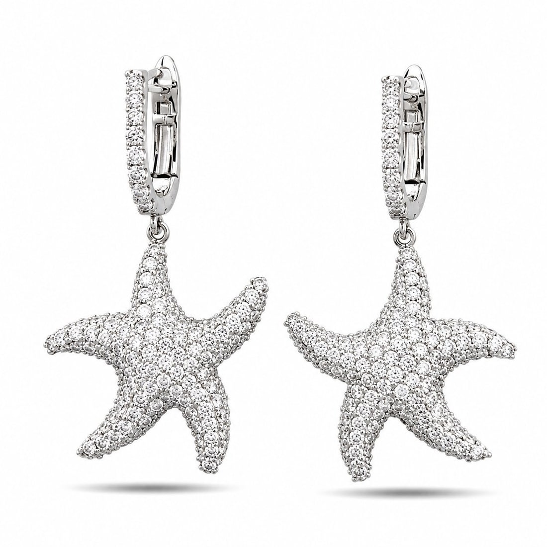 14K White Gold Diamond Starfish Earrings: 14K White Gold Diamond Starfish Earrings A sculptural pair of 14K white gold starfish earrings, fully pavé-set with diamonds across the entire surface. Each earring features a secure pin-and-clip fas