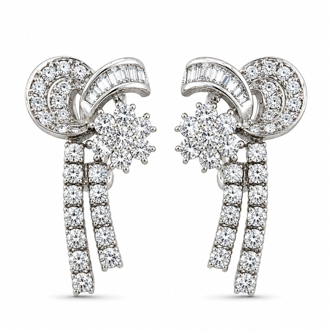 14K White Gold Flexible 2.0ct Diamond Strand Earrings: 14K White Gold Flexible 2.0ct Diamond Strand Earrings A refined pair of white gold earrings designed with flexible diamond strands cascading on each side. The movement of the strands gives the earring