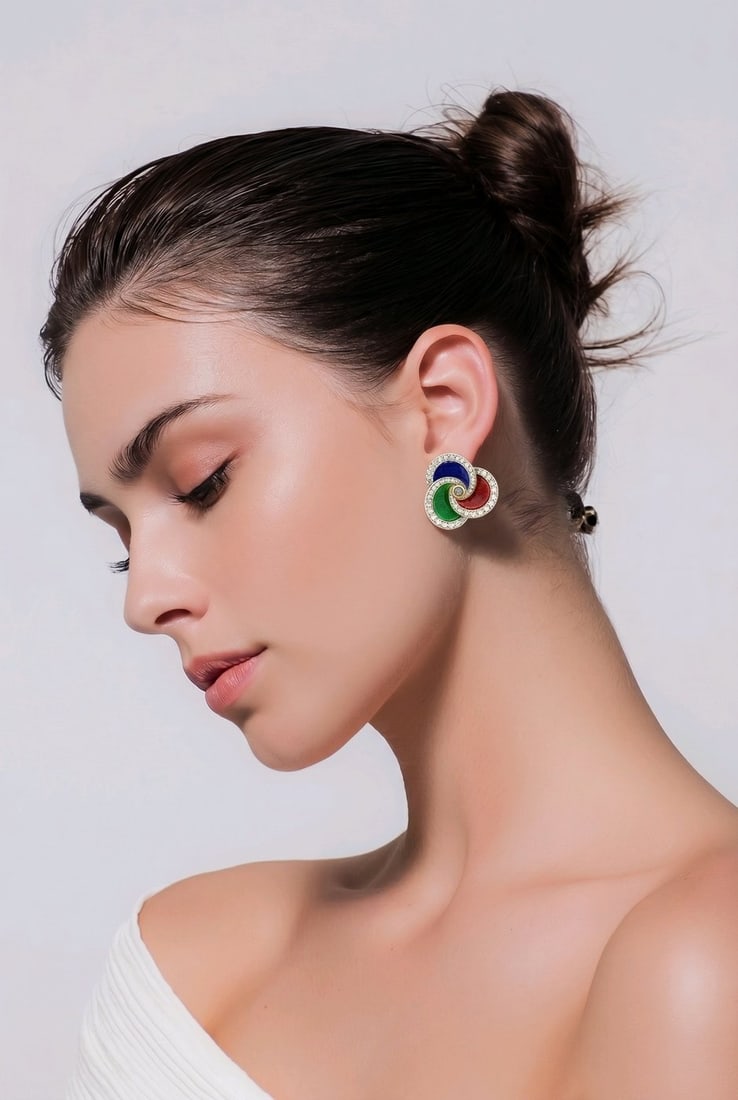 18K Yellow Gold Enamel 1.17ct Diamond and Sapphire Earrings: 18K Yellow Gold Enamel 1.17ct Diamond and Sapphire earrings A vibrant and beautifully detailed pair of circular earrings crafted in 18 karat yellow Gold. The design is enriched with blue, red, and gre