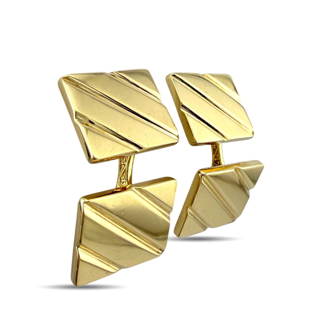 Tiffany & Co. 14K Yellow Gold Men’s Cufflinks: Tiffany & Co. Men’s Cufflinks 14K Yellow Gold A refined pair of Tiffany & Co. men’s cufflinks crafted in yellow gold with a classic polished presentation. The elegant face design and substantial