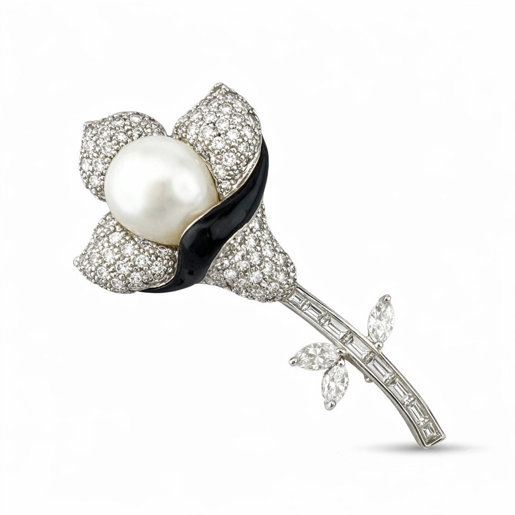 18K White Gold and 5.61ct Diamond Flower Brooch: 18K White Gold Pearl and 5.61ct Diamond Flower Brooch A beautifully sculpted flower brooches crafted in 18 karat white Gold, designed with a large pearl forming the flower's nectar at the center. The 