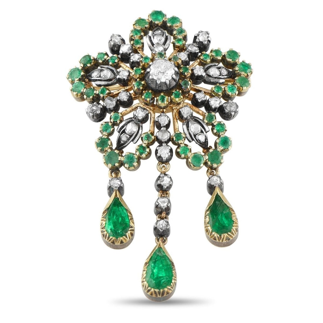 Antique 18K Rose Gold and Silver 1.5ct Diamond and Emerald Brooch: Antique 18K Rose Gold and Silver 1.5ct Diamond and Emerald Brooch This opulent antique brooch exudes old world elegance. Crafted from a combination of 18K Rose Gold and Silver, the dynamic design come