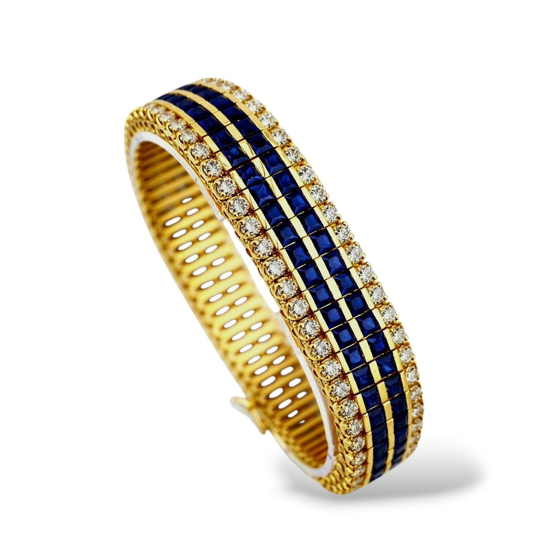 Art Deco 18K Yellow Gold 21ct Sapphire and 7.2ct Diamond Bracelet: Art Deco 18K Yellow Gold 21.0ct Sapphire and 7.2ct Diamond Bracelet This bracelet presents a refined sequence of polished gold links, each set with a matched pair of sapphires and diamonds that create