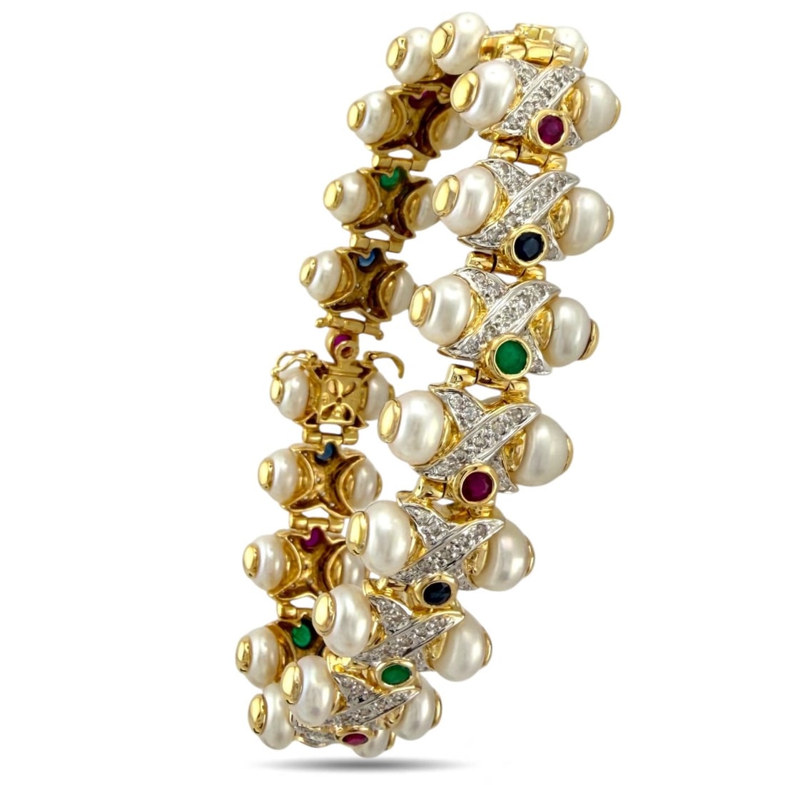 14K Yellow Gold Sapphire, Ruby, Emerald, Pearl and 1.03ct Diamond Bracelet: 14K Yellow Gold Sapphire, Ruby, Emerald, Pearl and 1.03ct Diamond Bracelet This bracelet features a sequence of polished yellow gold links, each set with a bright gemstone that brings color and elegan