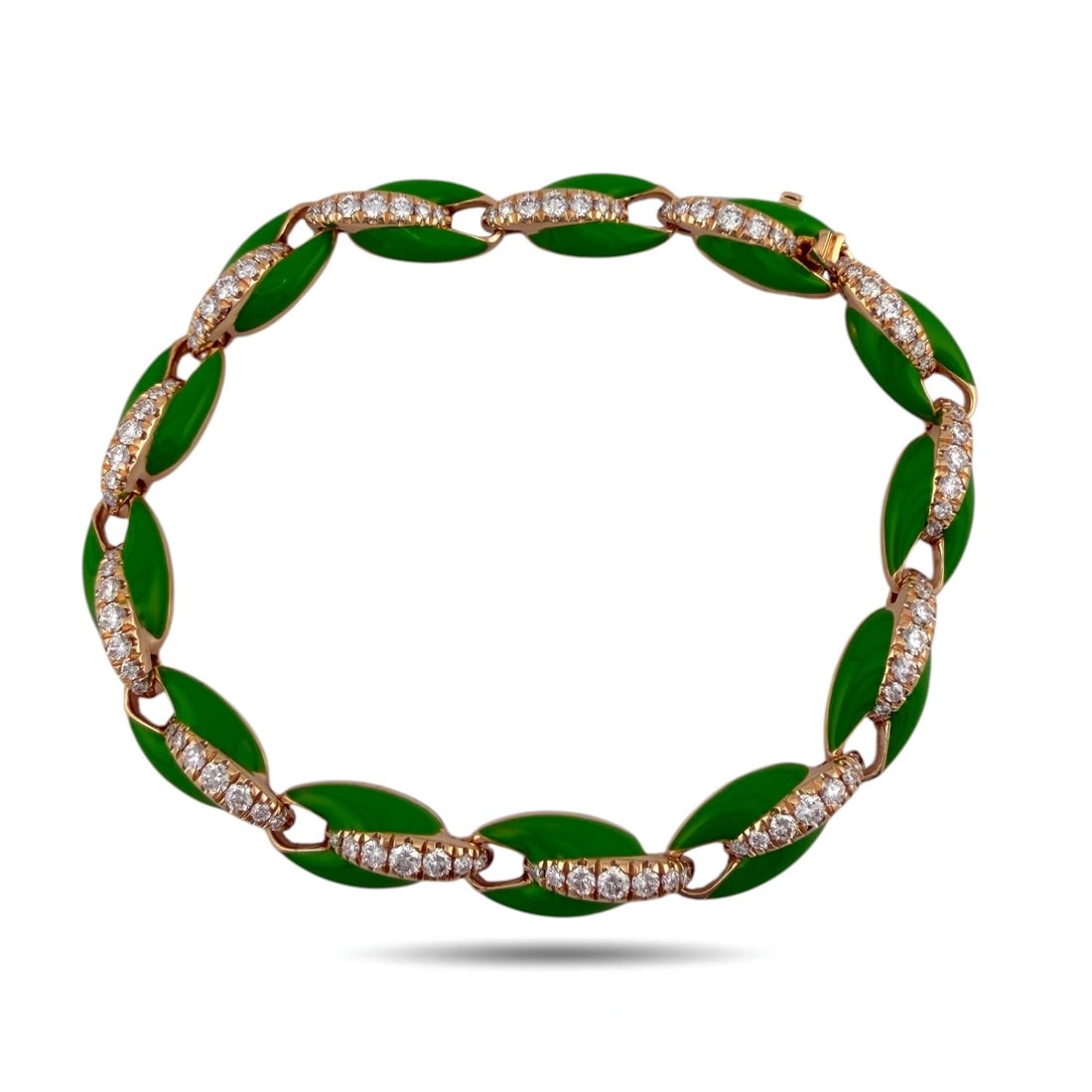 18K Rose Gold Green Enamel and 1.33ct Diamond Link Bracelet: 18K Rose Gold Green Enamel and 1.33ct Diamond Link Bracelet A refined 18K rose gold bracelet featuring rich green enamel panels elegantly connected by diamond-set links totaling 1.33 carats. The
