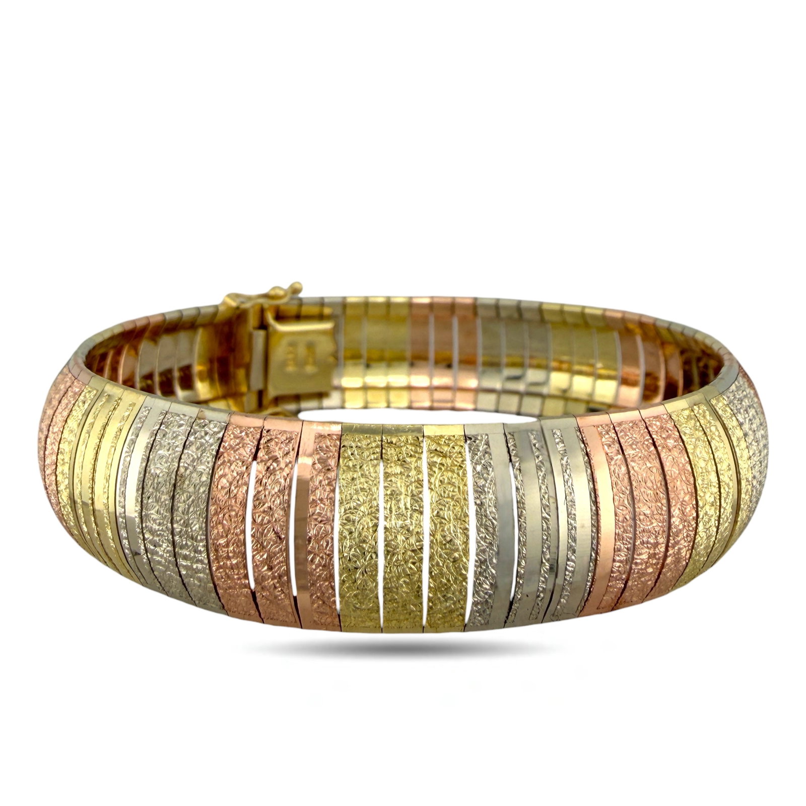 14K Tri-Color Gold Flexible Bracelet: 14K Tri-Color Gold Flexible Bracelet Crafted in 14K yellow, white, and rose gold, this elegant bracelet features a smooth, fluid design that drapes comfortably on the wrist. The tri-color composition 