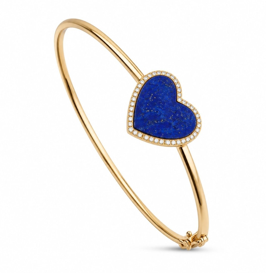 14K Rose Gold Lapis Lazuli Heart and 0.22ct Diamond Bracelet: 14K Rose Gold Lapis Lazuli Heart and 0.22ct Diamond Bracelet A charming rose gold bracelet designed with a carved lapis lazuli heart centerpiece, surrounded by delicate diamond accents. The deep blue 